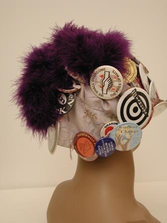 Image of Seattle Raging Grannies hat with activist buttons, ca. 1995