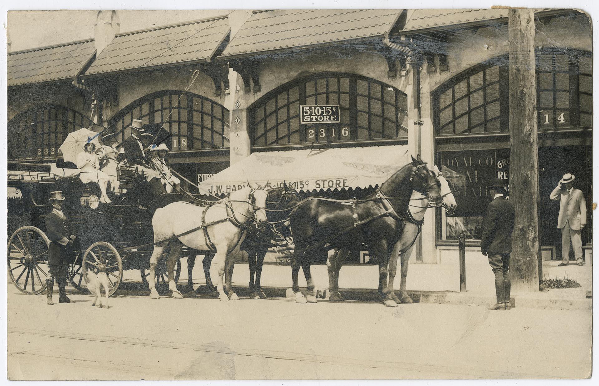 Image of Treat family in front of Loyal Building on Market Street, Seattle, circa 1912