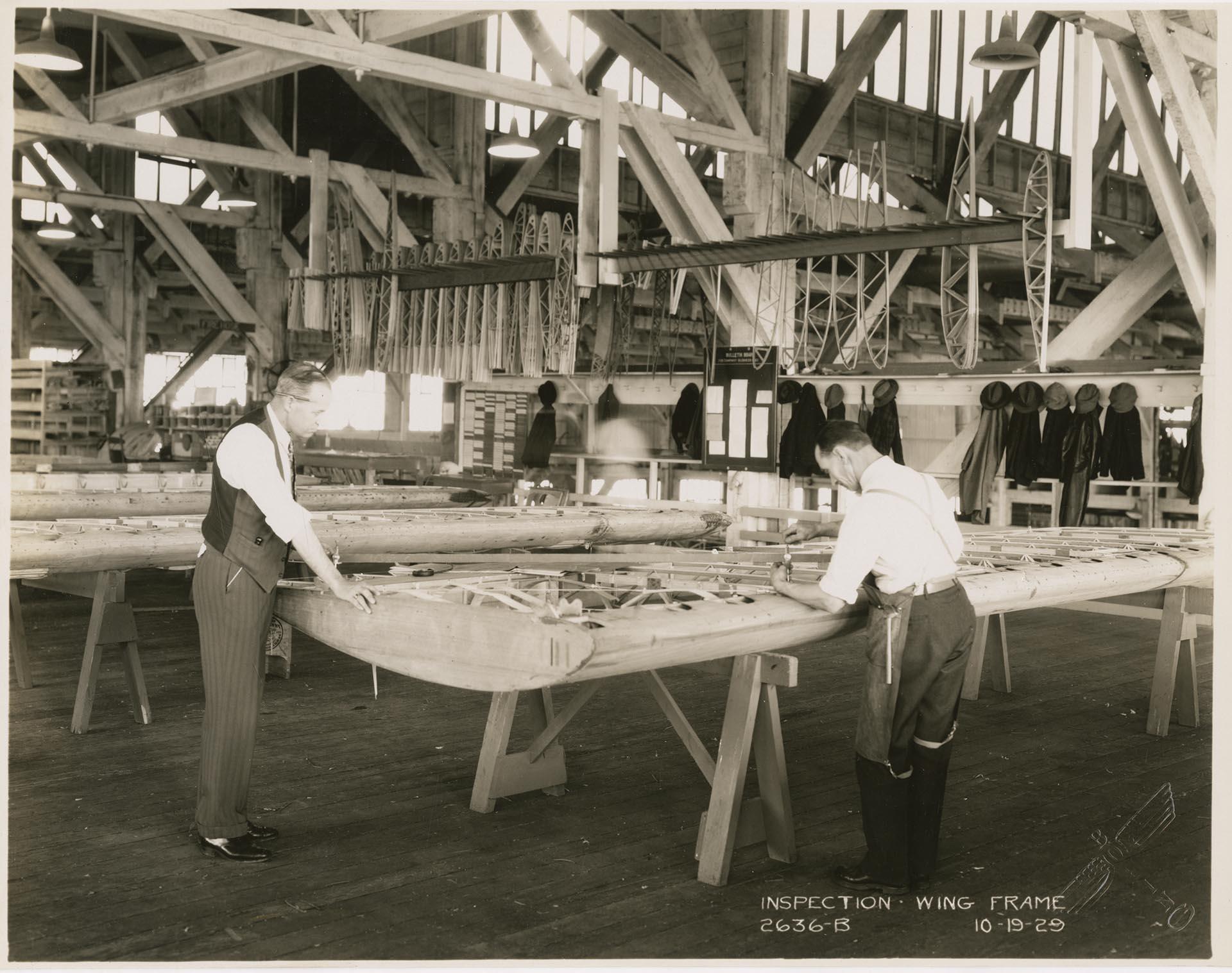 Image of Inspectors examining a wing frame at the Boeing factory, Seattle, October 19, 1929