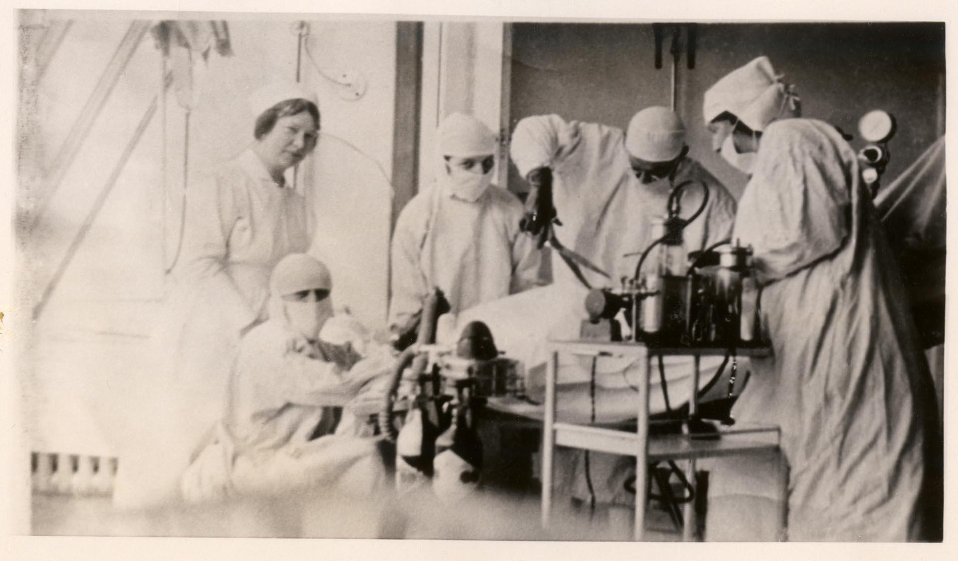 Image of Nurses and doctors during a surgery at Minor Private Hospital, circa 1920
