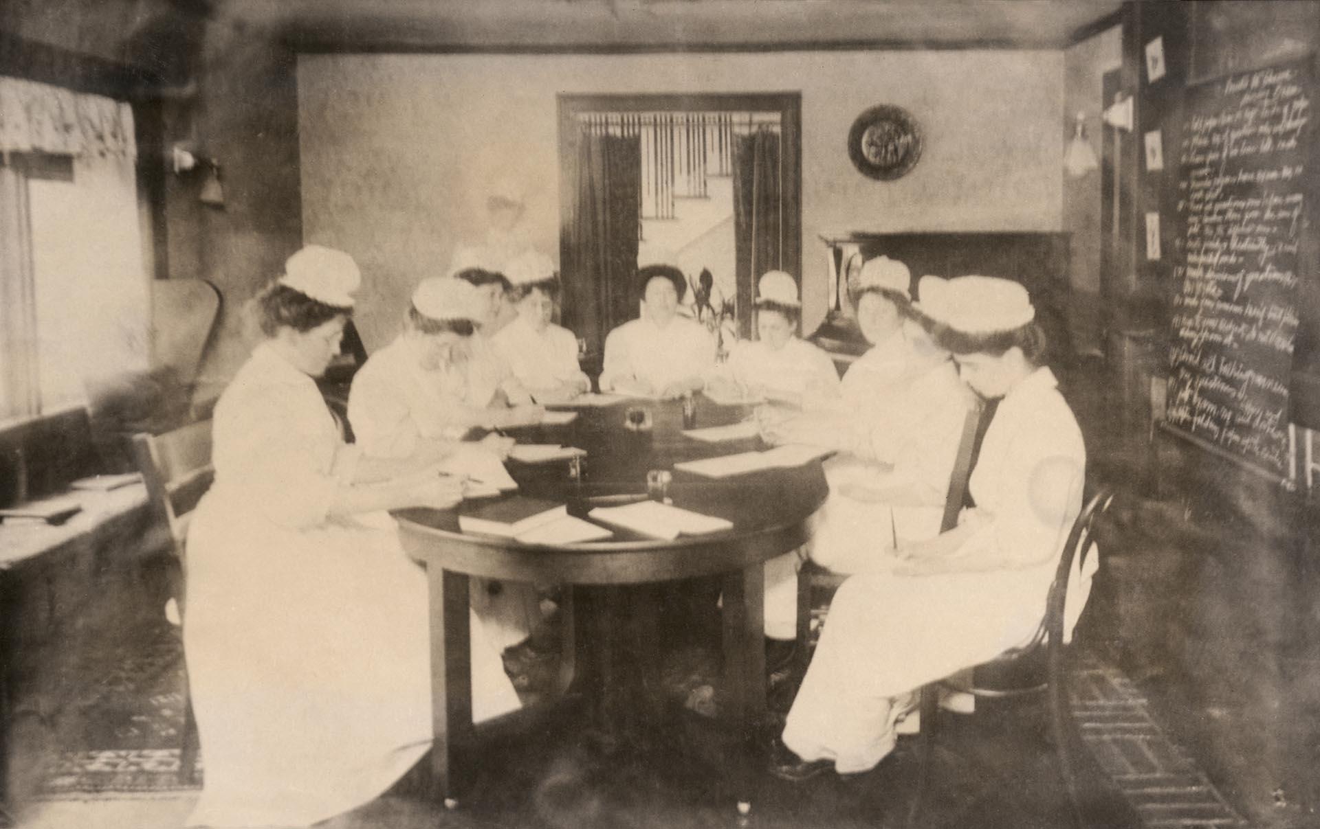Image of Nursing students sitting for exam at Minor Private Hospital nursing school, 1910