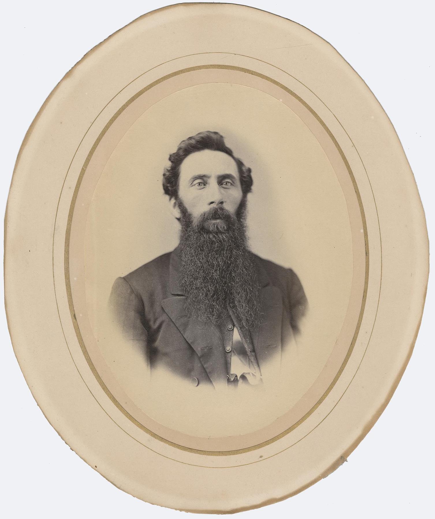 Image of Moses R. Maddocks posing in studio, Seattle, circa 1875