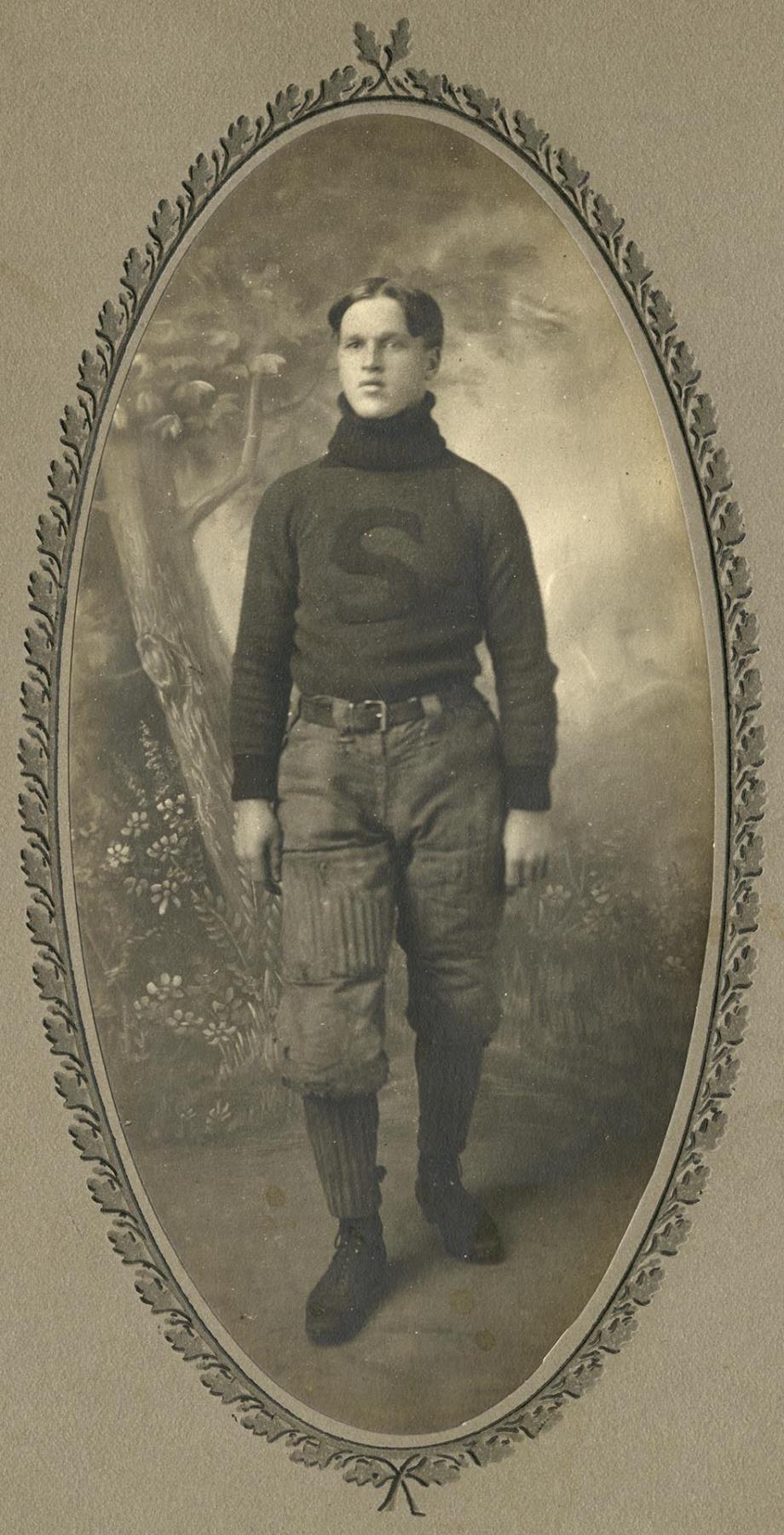 Image of Charles Wasson posing in studio, Seattle, 1905