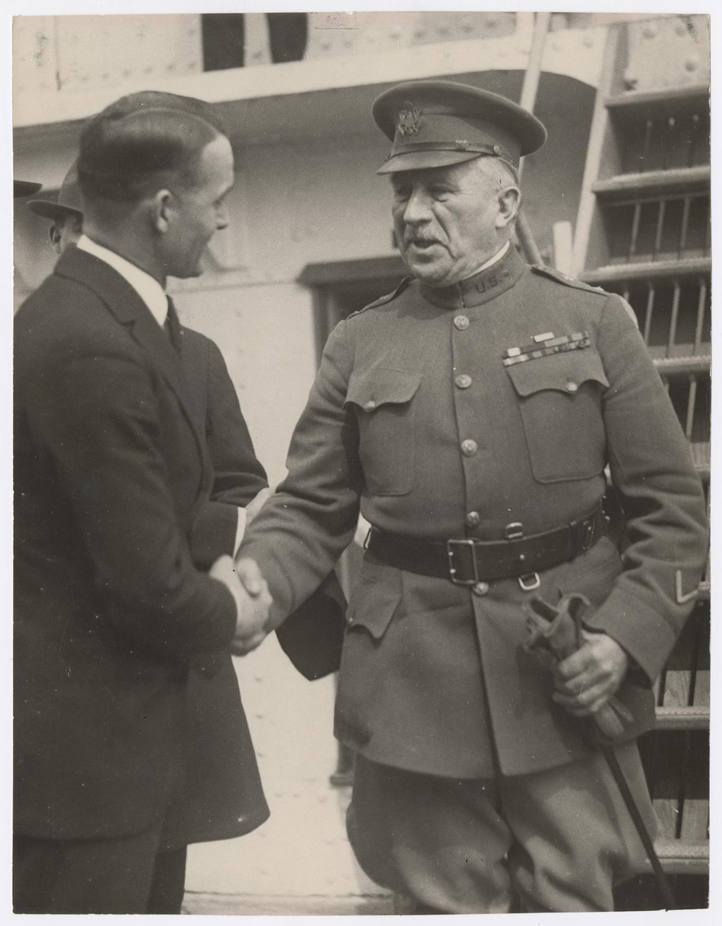 Image of Wee Coyle greeting General Leonard Wood on Wenatchee, Seattle, April 9, 1921