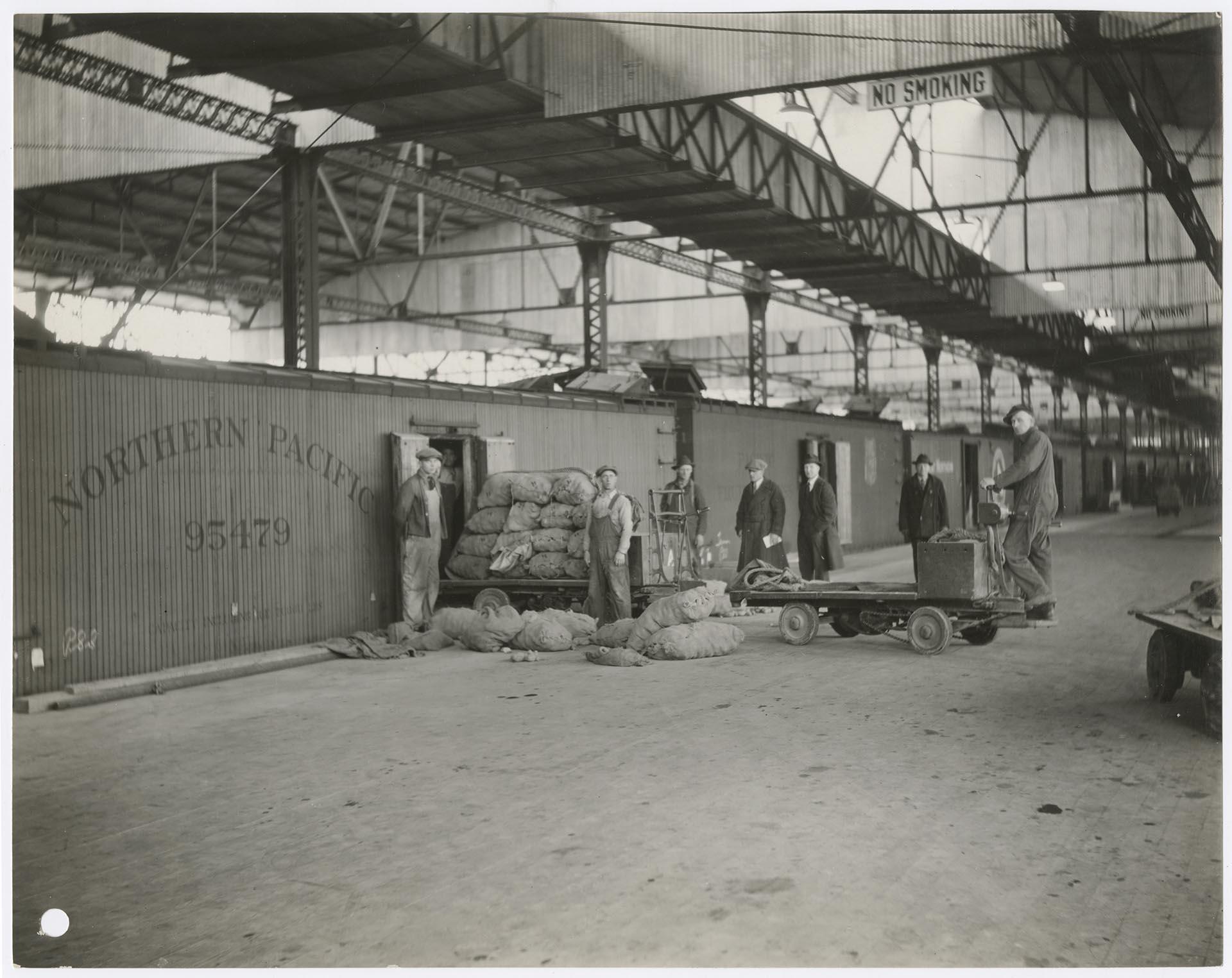 Image of Employees inside Admiral Line terminal at Pier D, Seattle, 1925