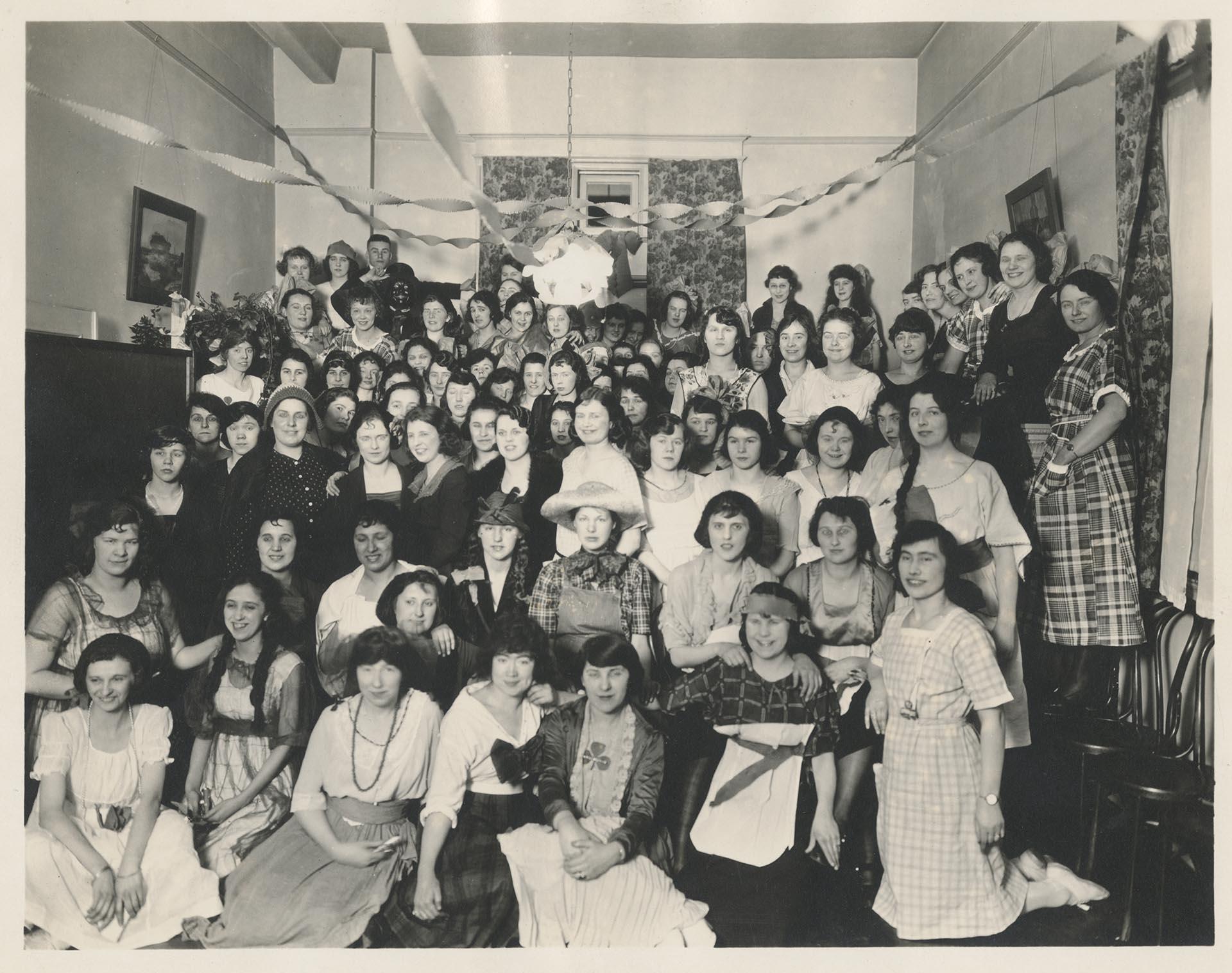 Image of Employees in costume posing at Pacific Telephone & Telegraph party, Seattle, 1920