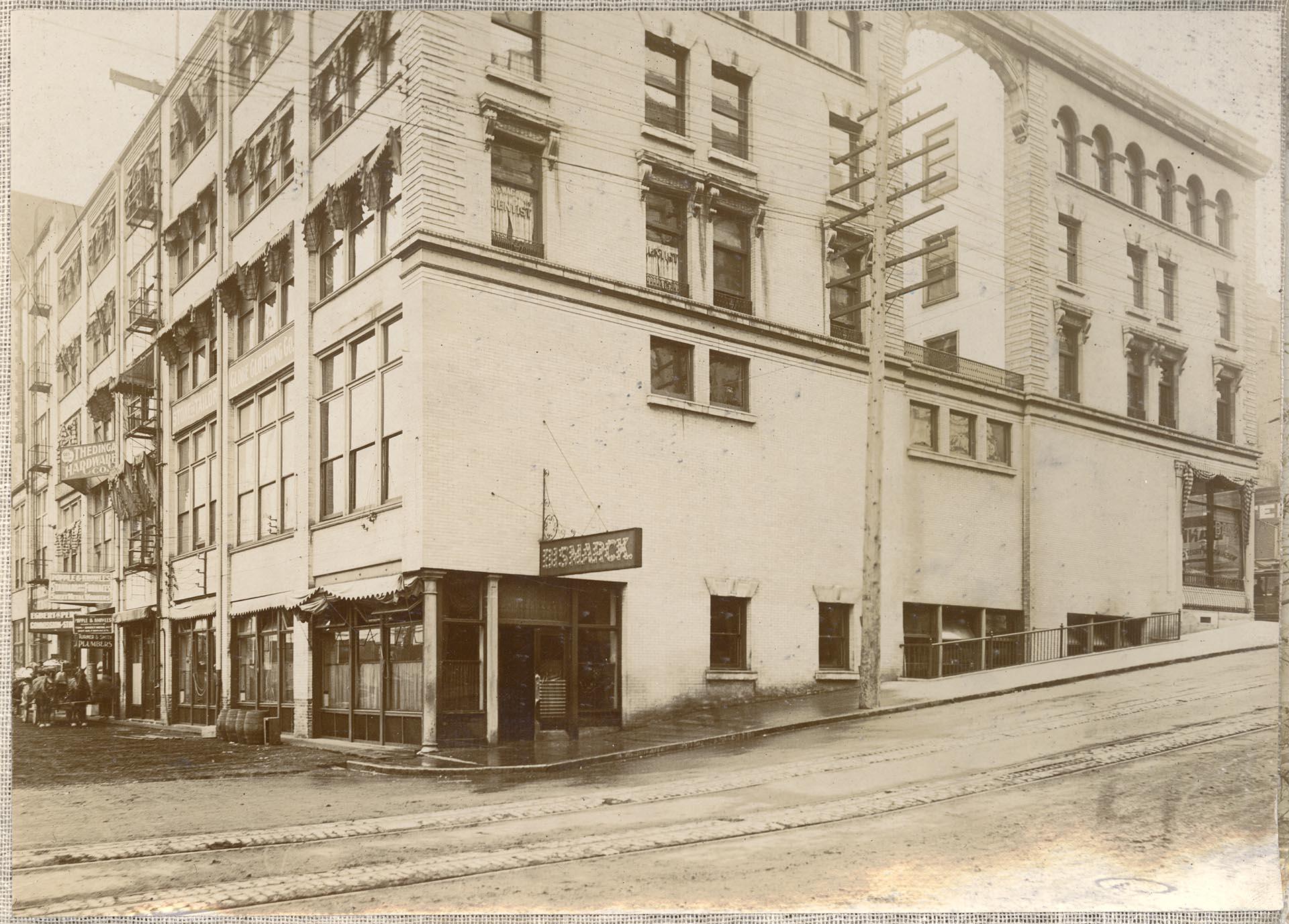 Image of Globe block, corner of Madison and Post Streets, Seattle, circa 1903