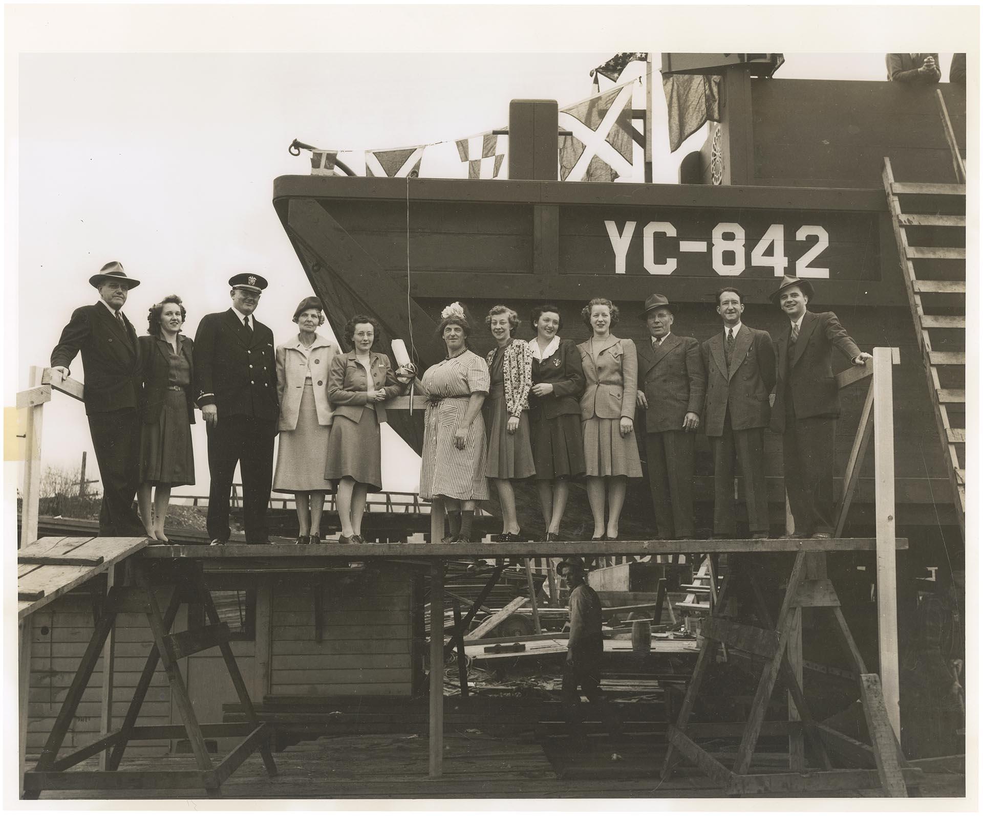 Image of Group at launch of Navy lighter YC-842 at the Olson & Winge Marine Works yard, Seattle, October 20, 1943