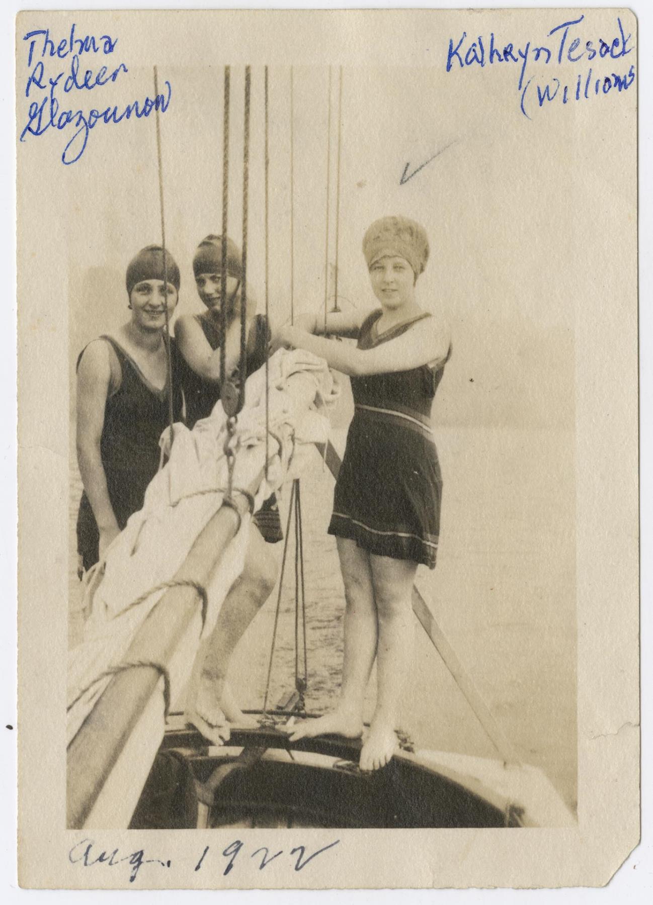 Image of Thelma Rydeen, Kathryn Tesack, and friend on sailboat, Puget Sound, August 1922