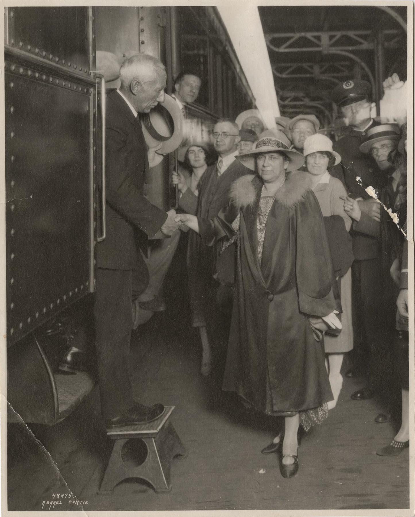 Image of Mayor Bertha Landes and Captain Roald Amundsen at train station, Seattle, June 28, 1926