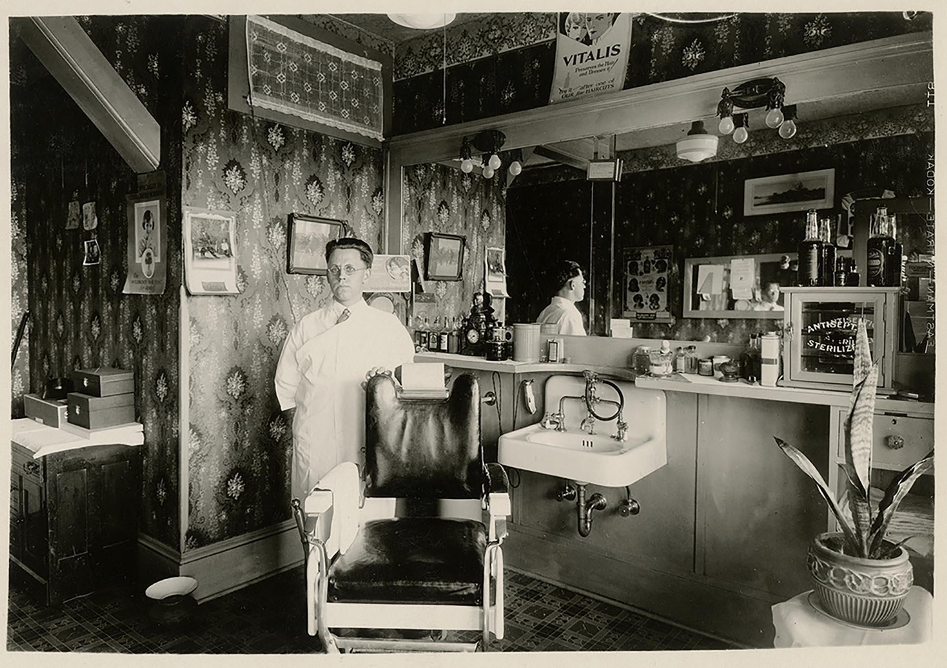 Image of Leonard Brand in his barber shop, Seattle, circa 1932