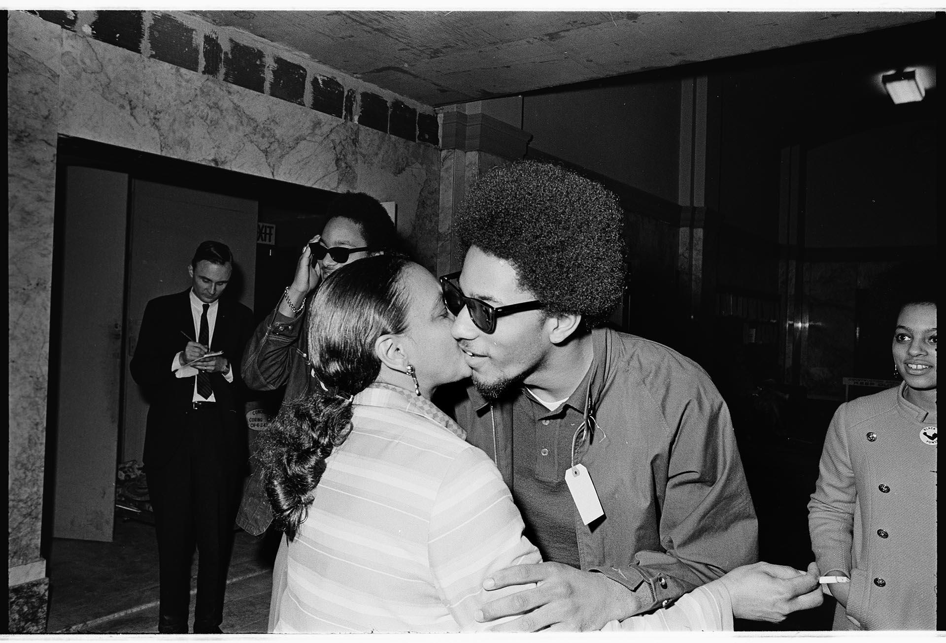 Image of Aaron Dixon with his mother at courthouse, April 5, 1968