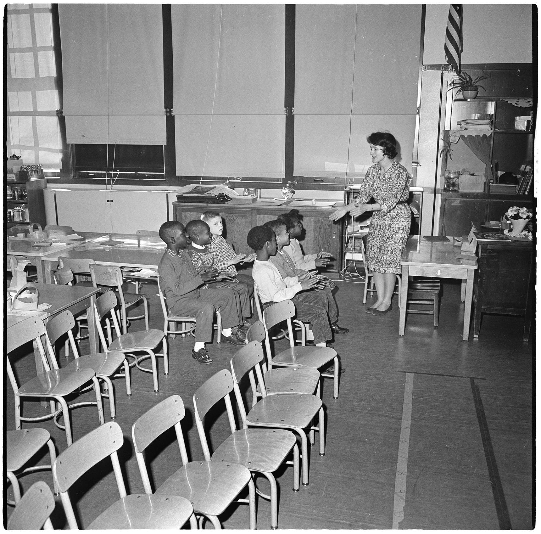 Image of Ruth Geissmar and students at TT Minor Elementary School, Seattle, March 31, 1966