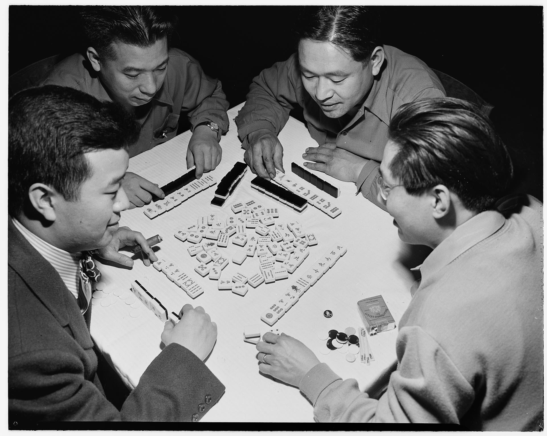 Image of Four men playing mahjong, Seattle, April 1947