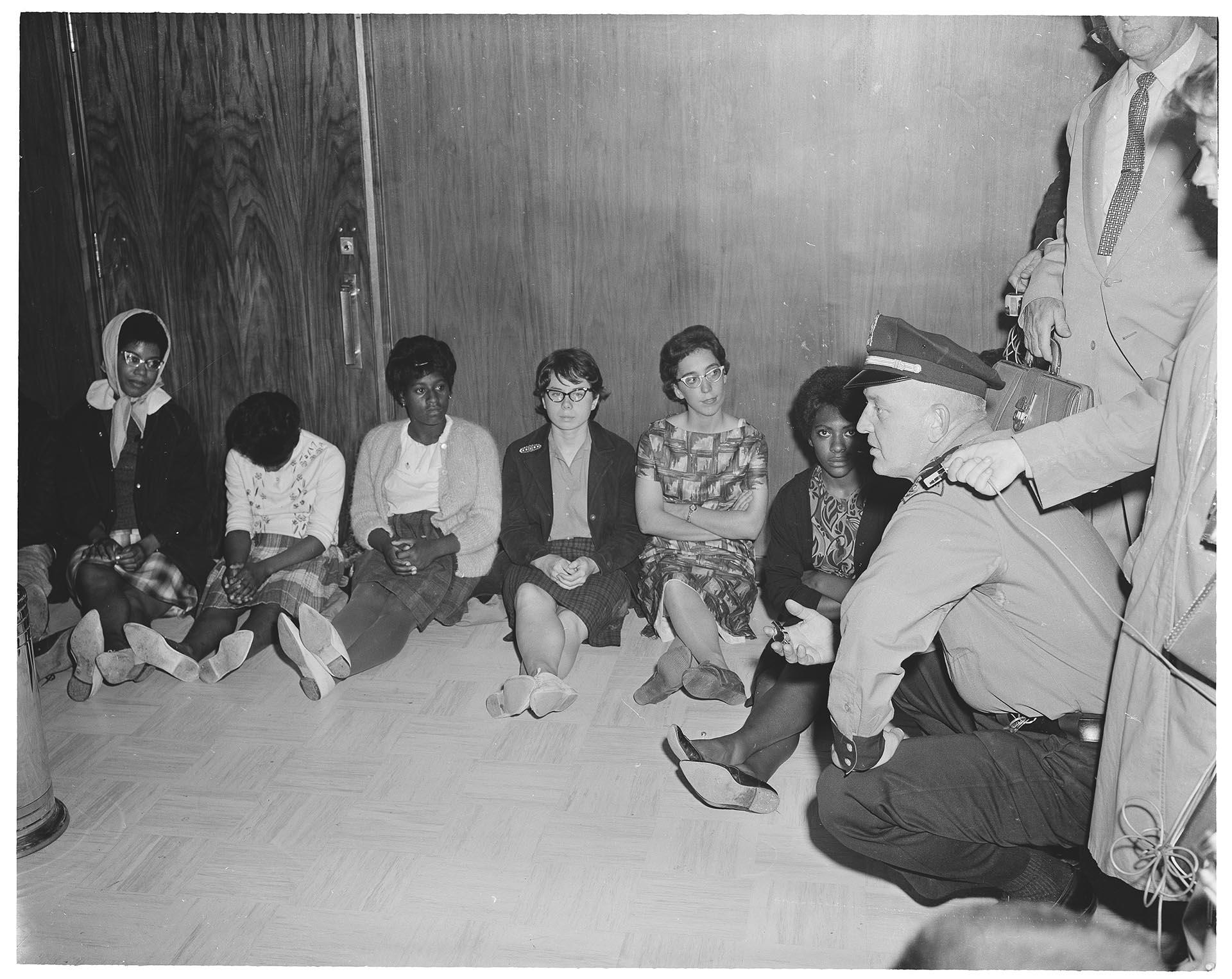Image of Assistant Police Chief Charles Rouse with demonstrators at City Hall, July 25, 1963