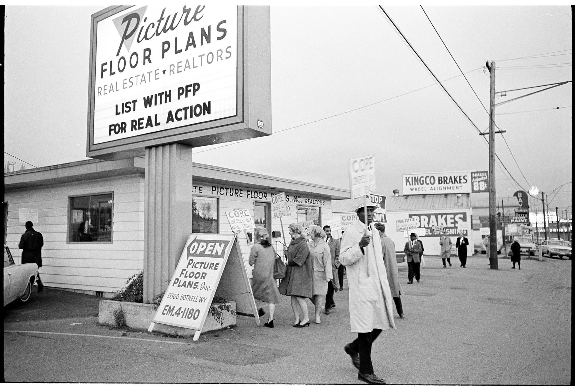 Image of CORE demonstrators outside Picture Floor Plans, Bothell, March 22, 1964