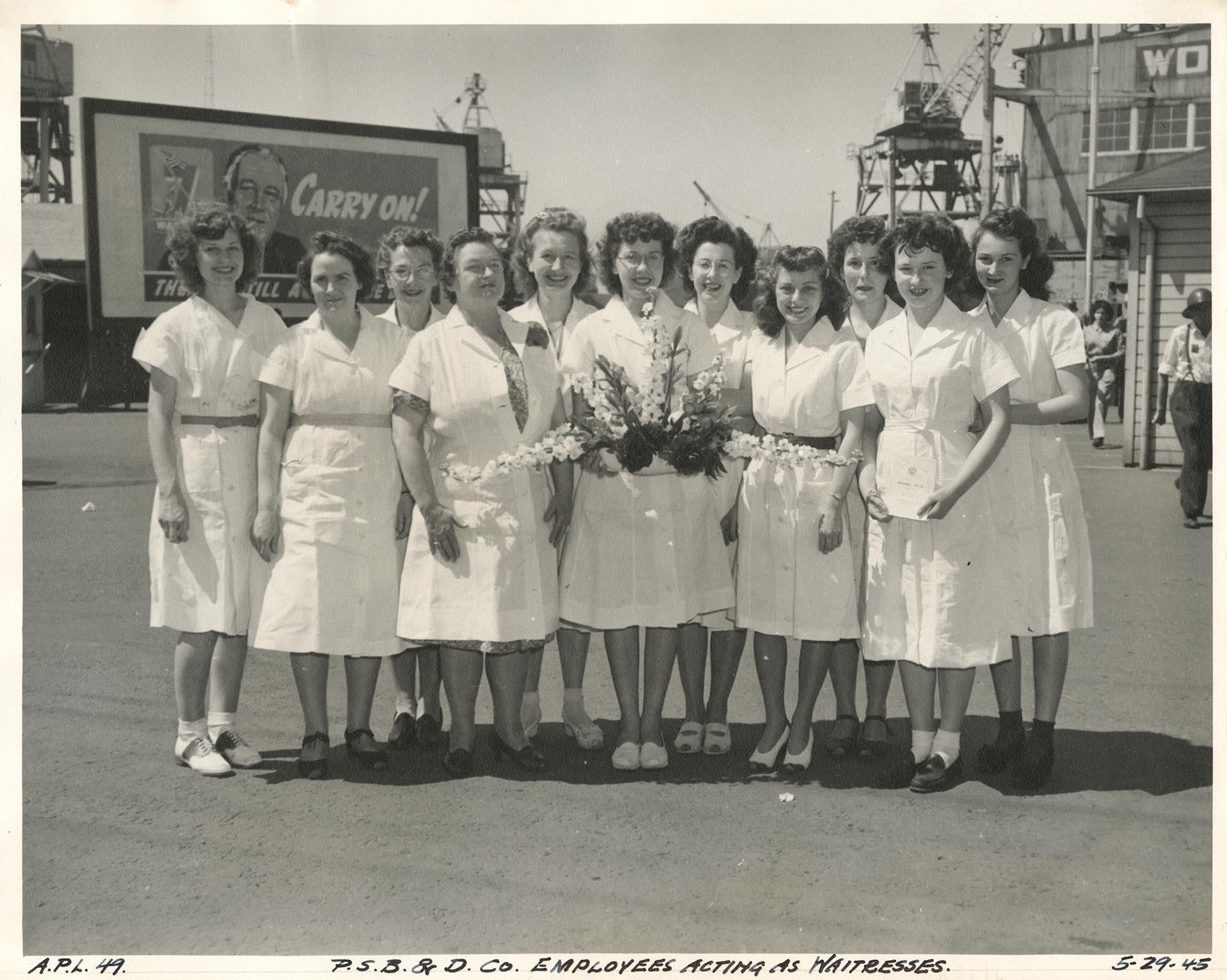 Image of Puget Sound Bridge and Dredging Company employees acting as waitresses for the APL 49 launch party, Seattle, May 29, 1945