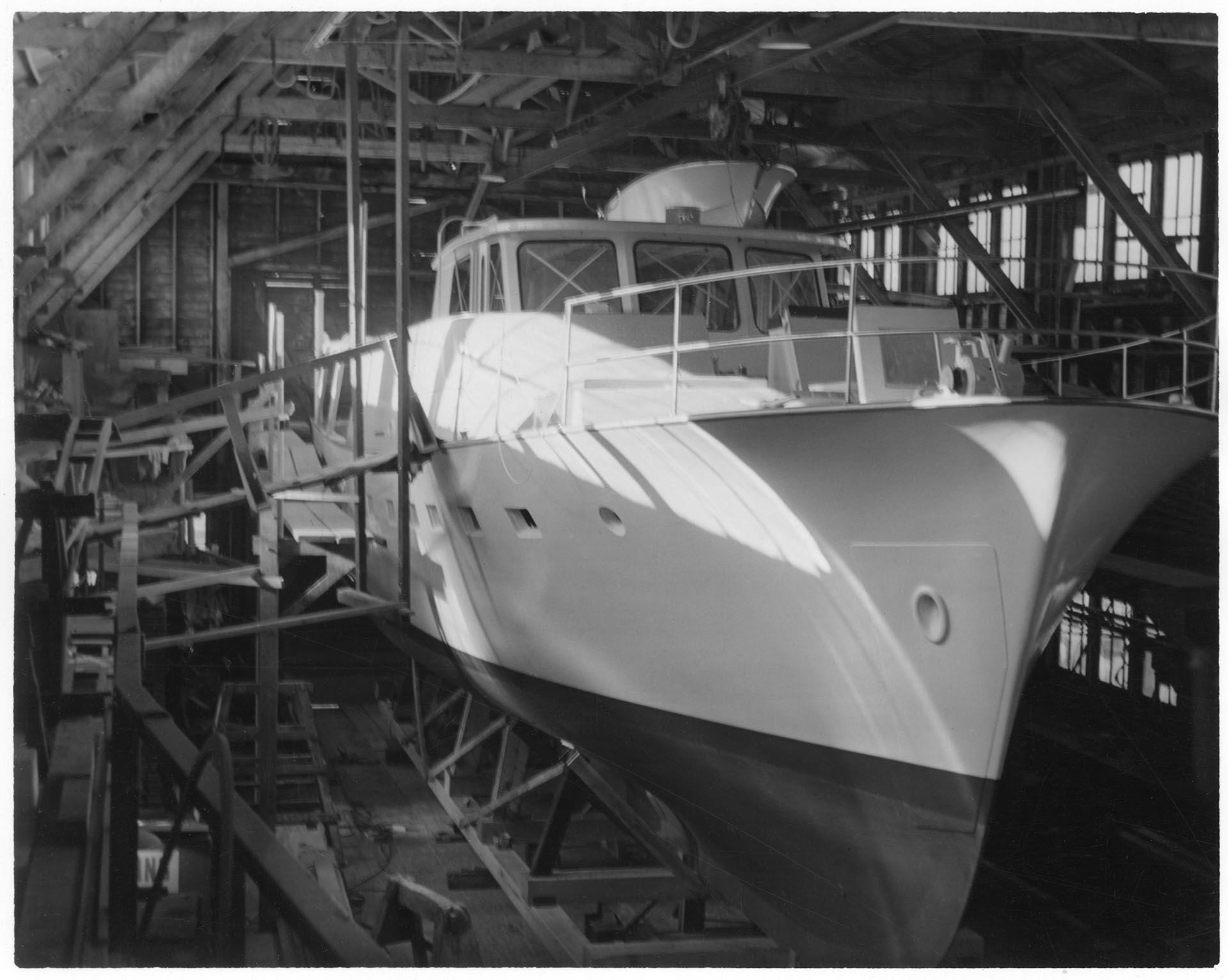 Image of Motor yacht Blue Heron II under construction at Blanchard Boat Co. yard, Seattle, circa 1955