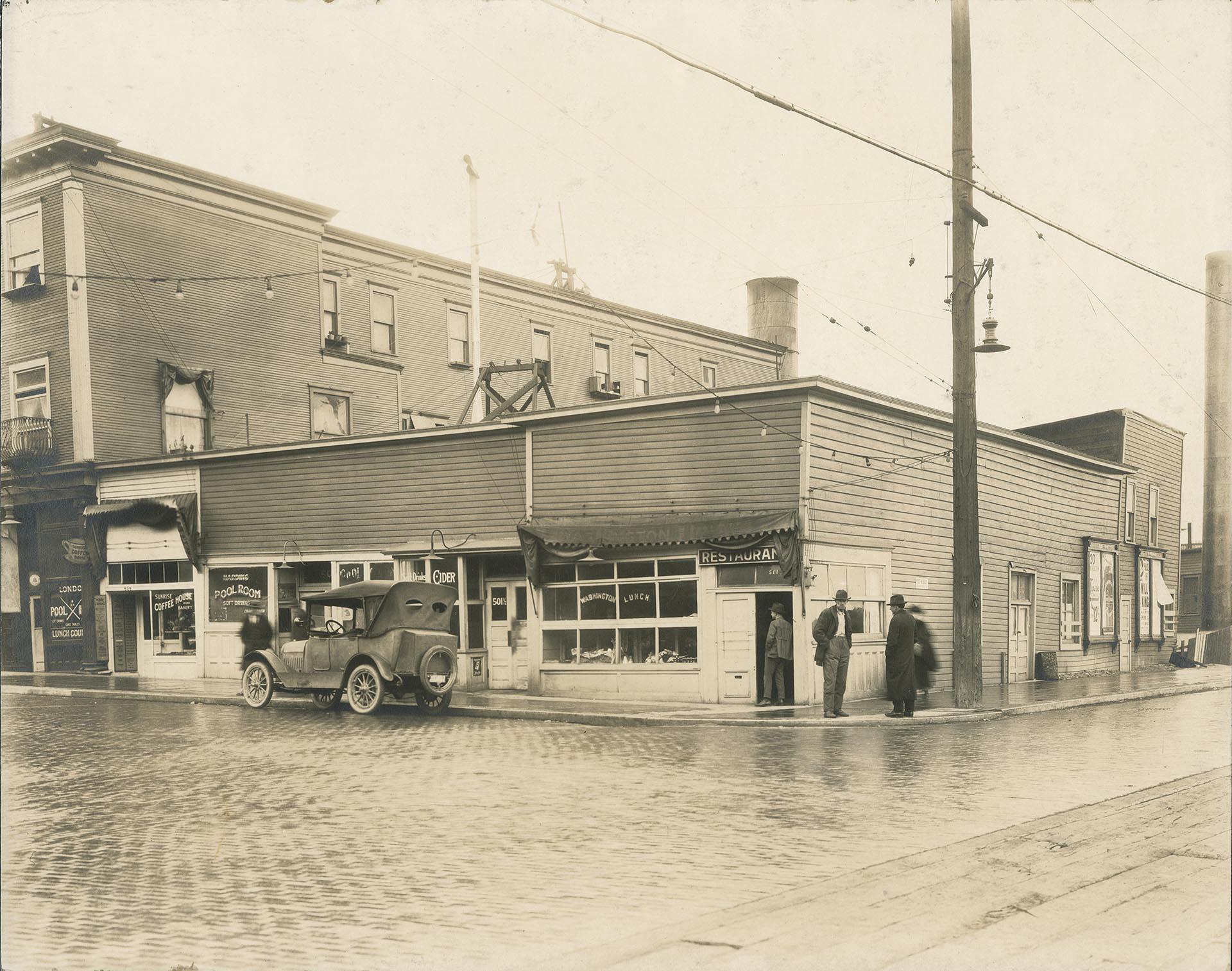 Image of Corner of S. King St. and 5th Ave S., Seattle, circa 1925
