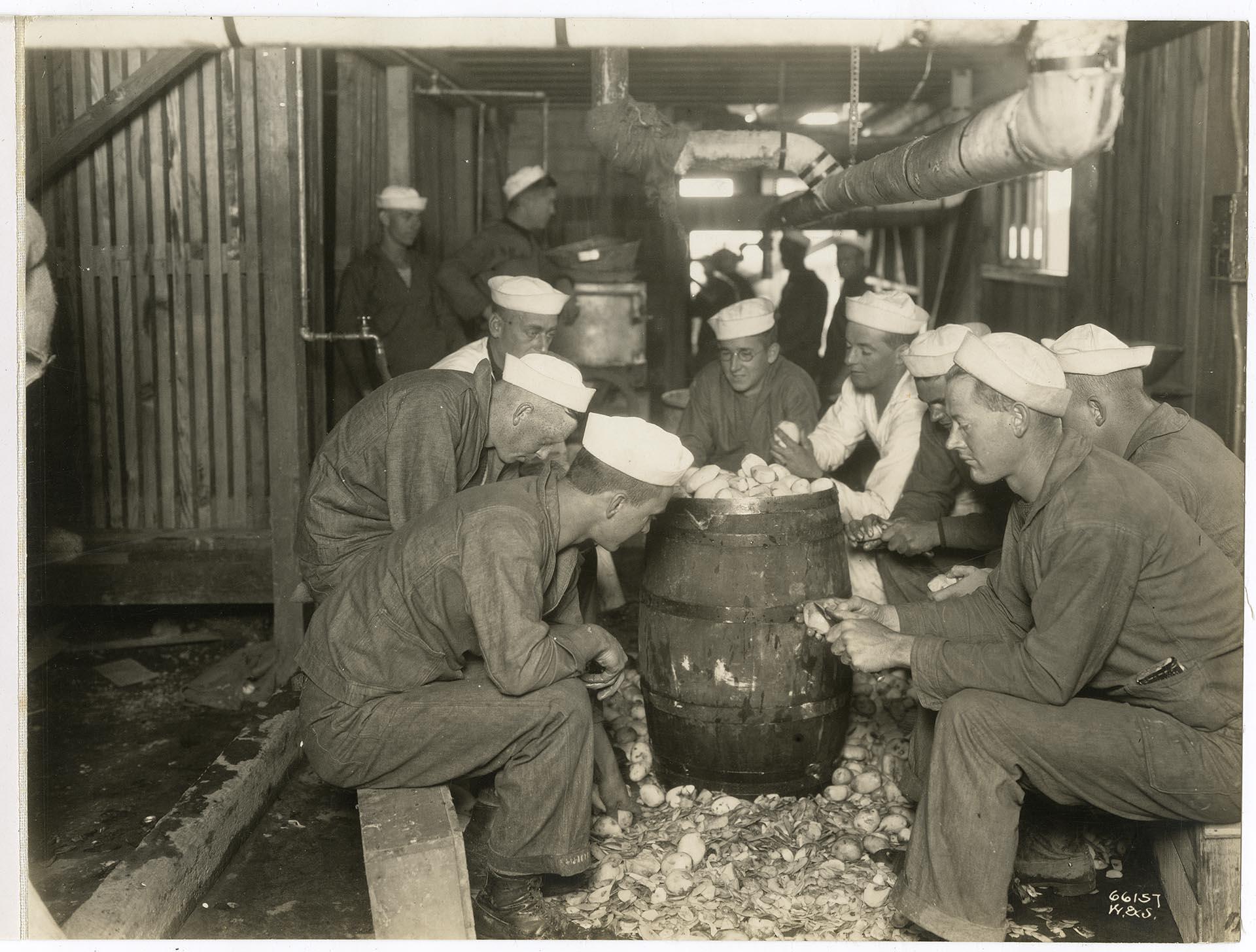 Image of Cadets peeling potatoes at the Naval Training Station, Seattle, circa 1918