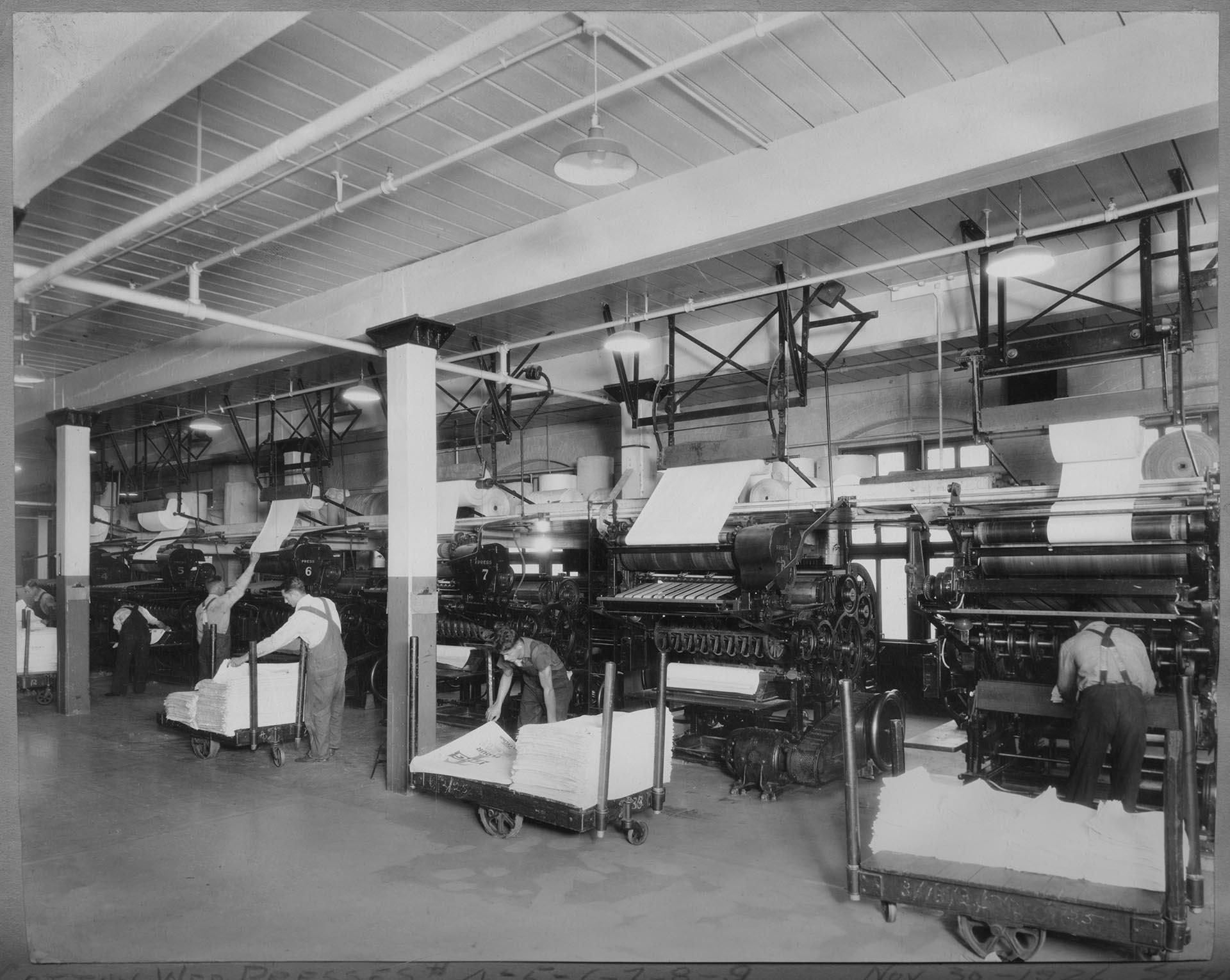 Image of Men working at cotton web presses at Bemis Bag Co. Seattle plant, November 30, 1926