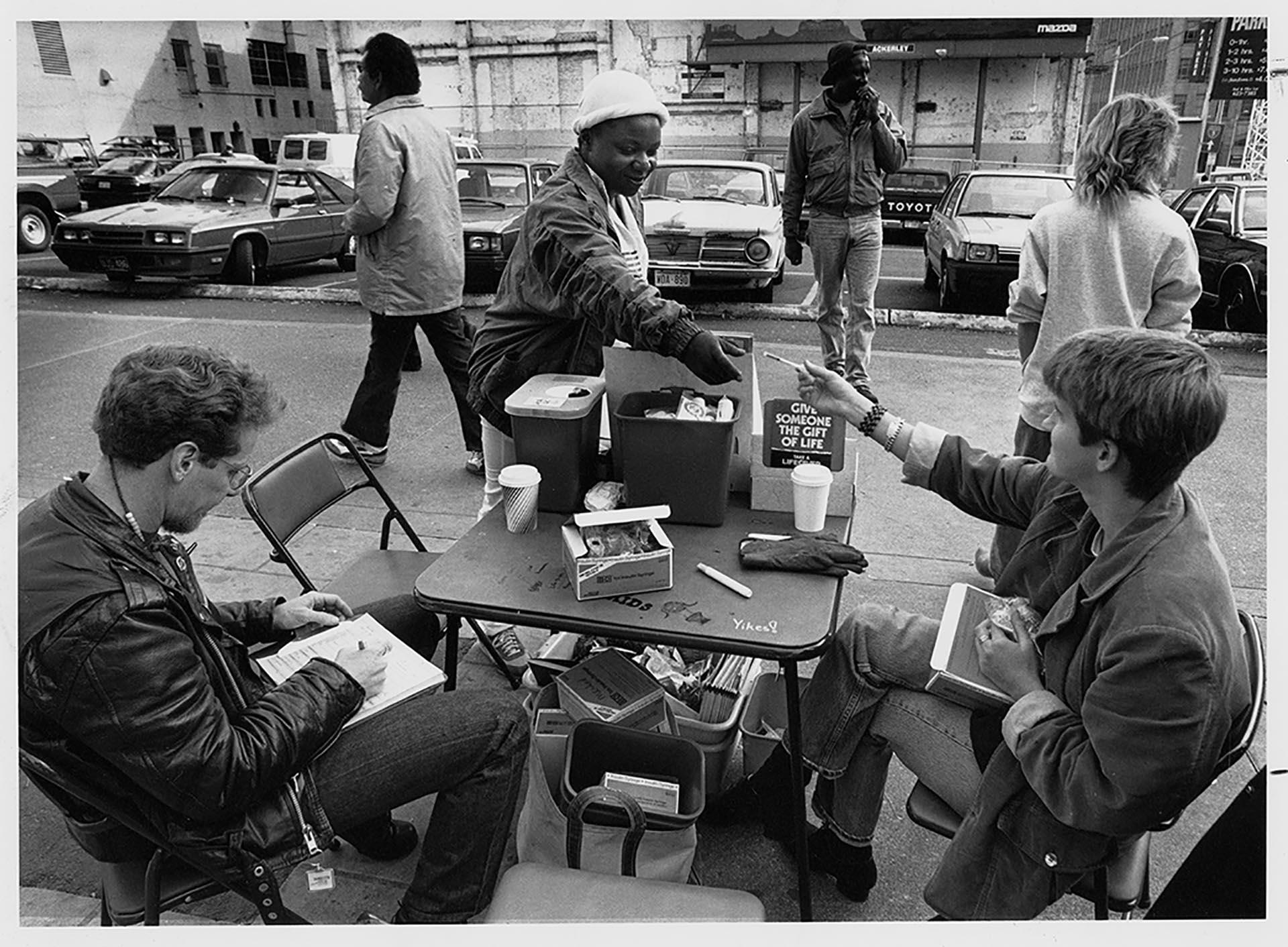 Image of Needle exchange table, Seattle, October 24, 1990