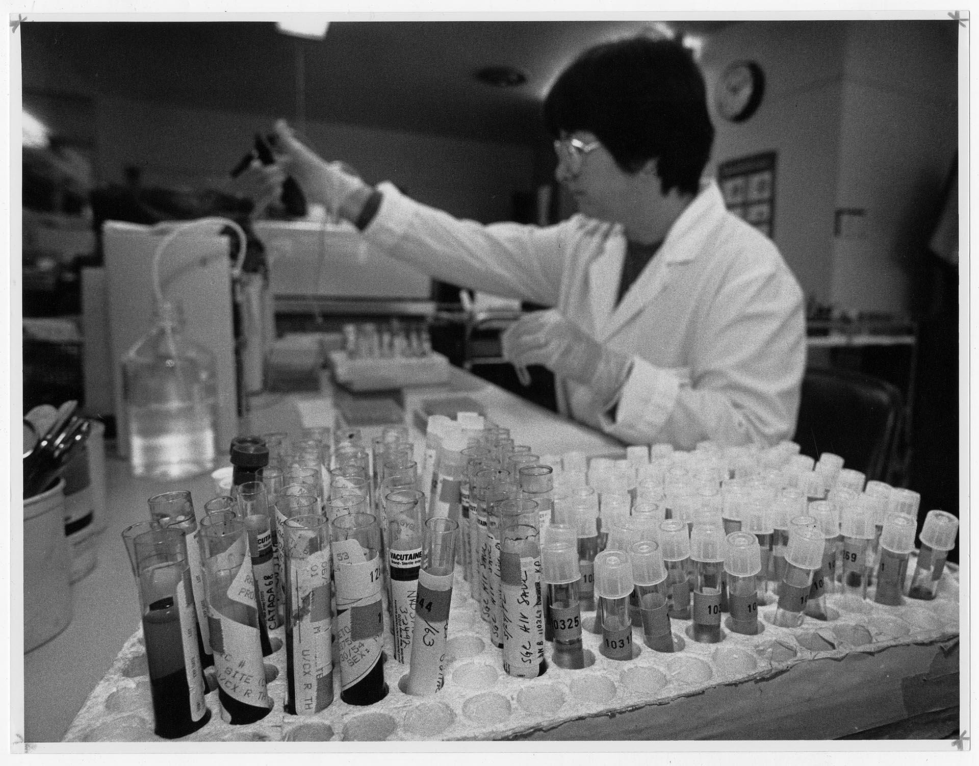 Image of Microbiologist with blood samples for HIV testing at the Public Health Lab, Seattle, March 26, 1992