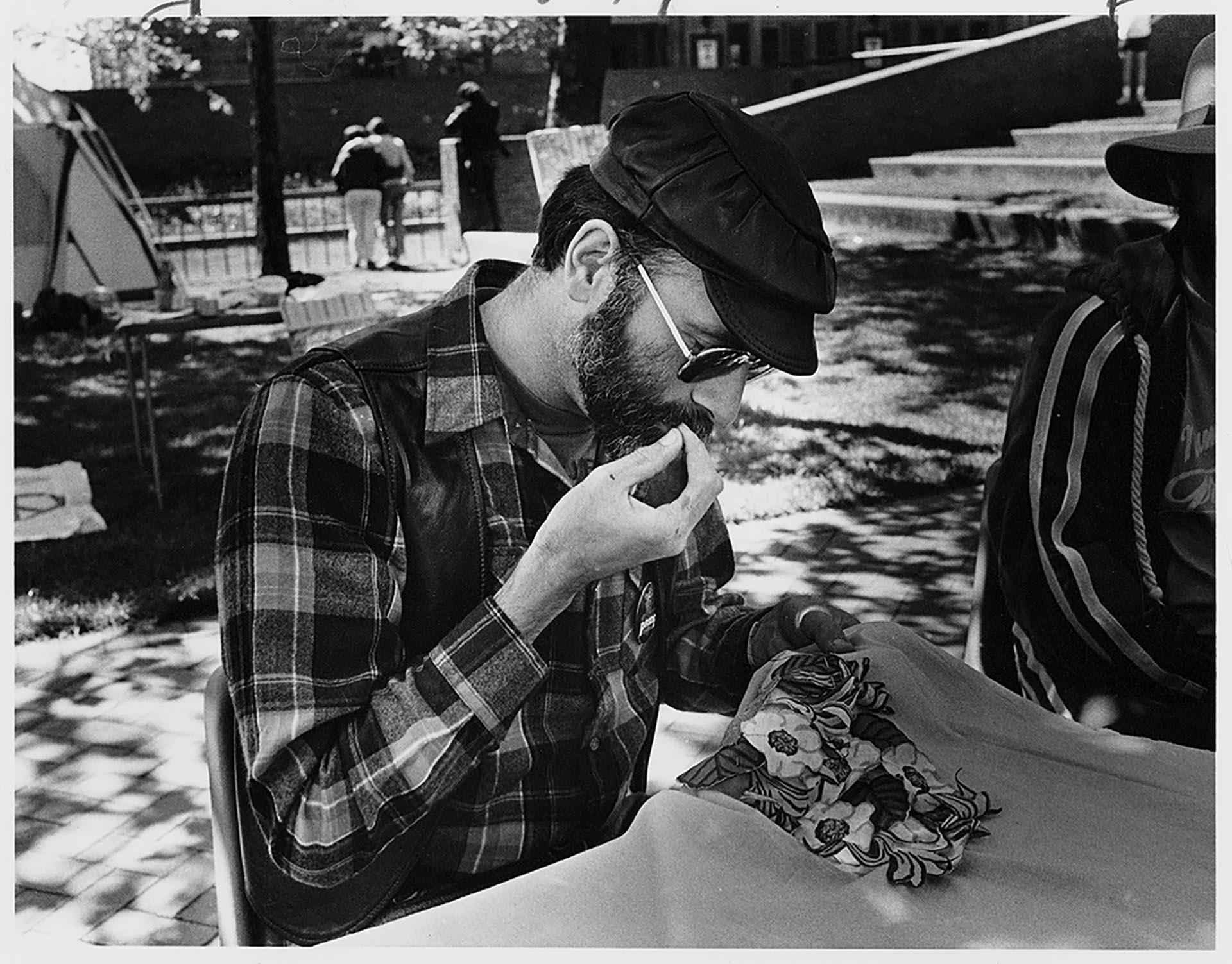 Image of Man working on quilt square during AIDS vigil at Seattle Central Community College, Seattle, May 29, 1988