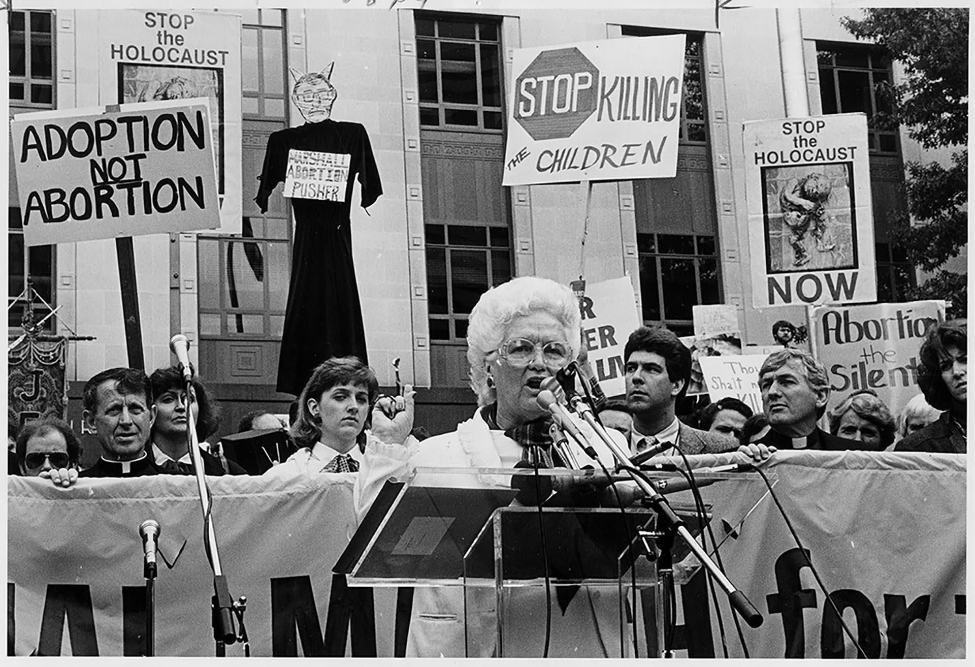 Image of Carolyn Sundseth speaking at anti-abortion rally at U. S. Courthouse, Seattle, May 30, 1985