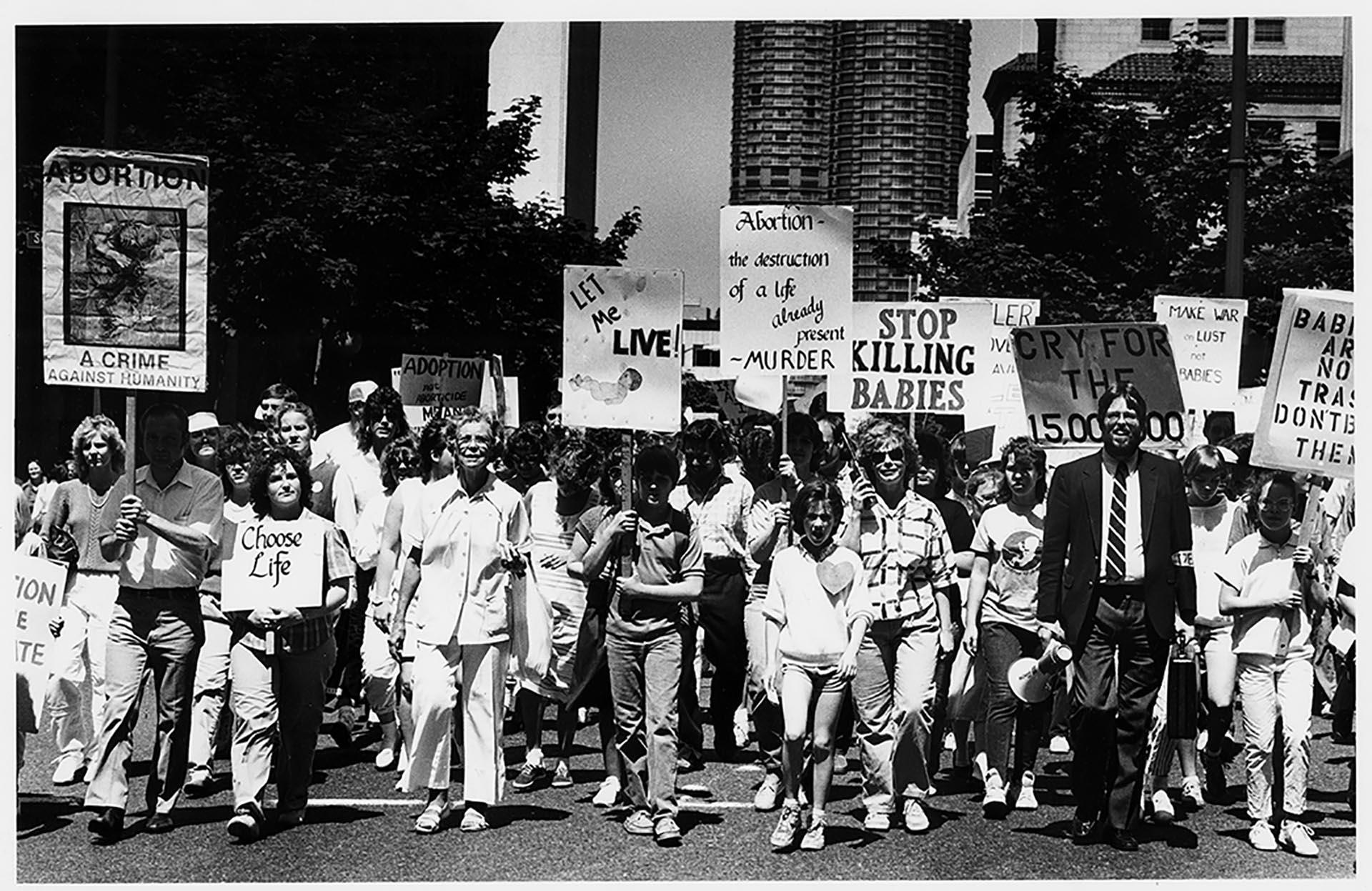 Image of Crowd marching in anti-abortion demonstration, Seattle, May 30, 1986