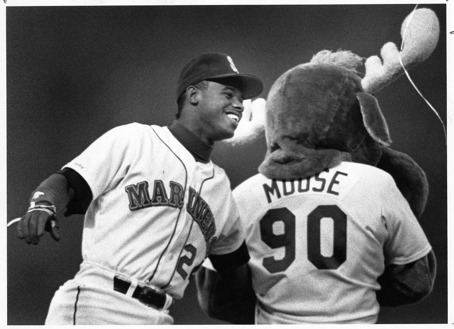 Image of Ken Griffey Jr. and the Mariner Moose before game at Kingdome, May 1990