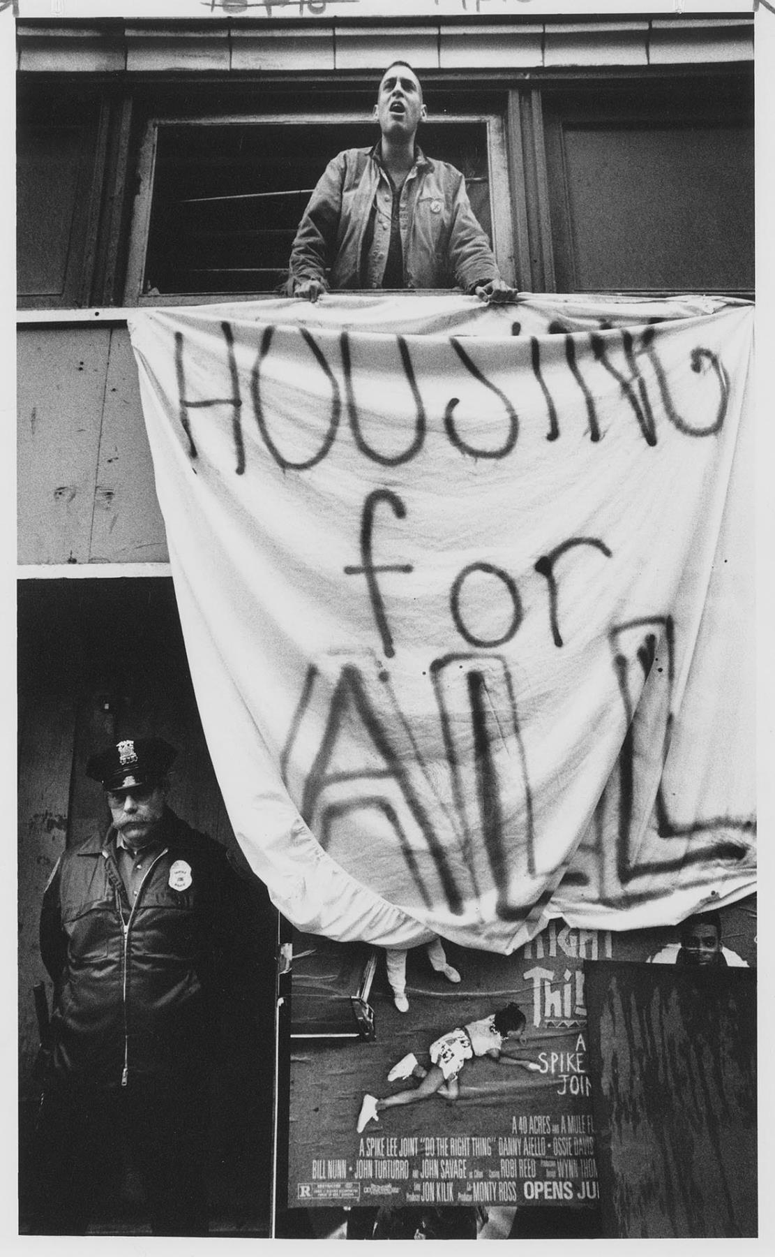 Image of Low-income housing advocate protesting at McKay Apartments, Seattle, July 1, 1989