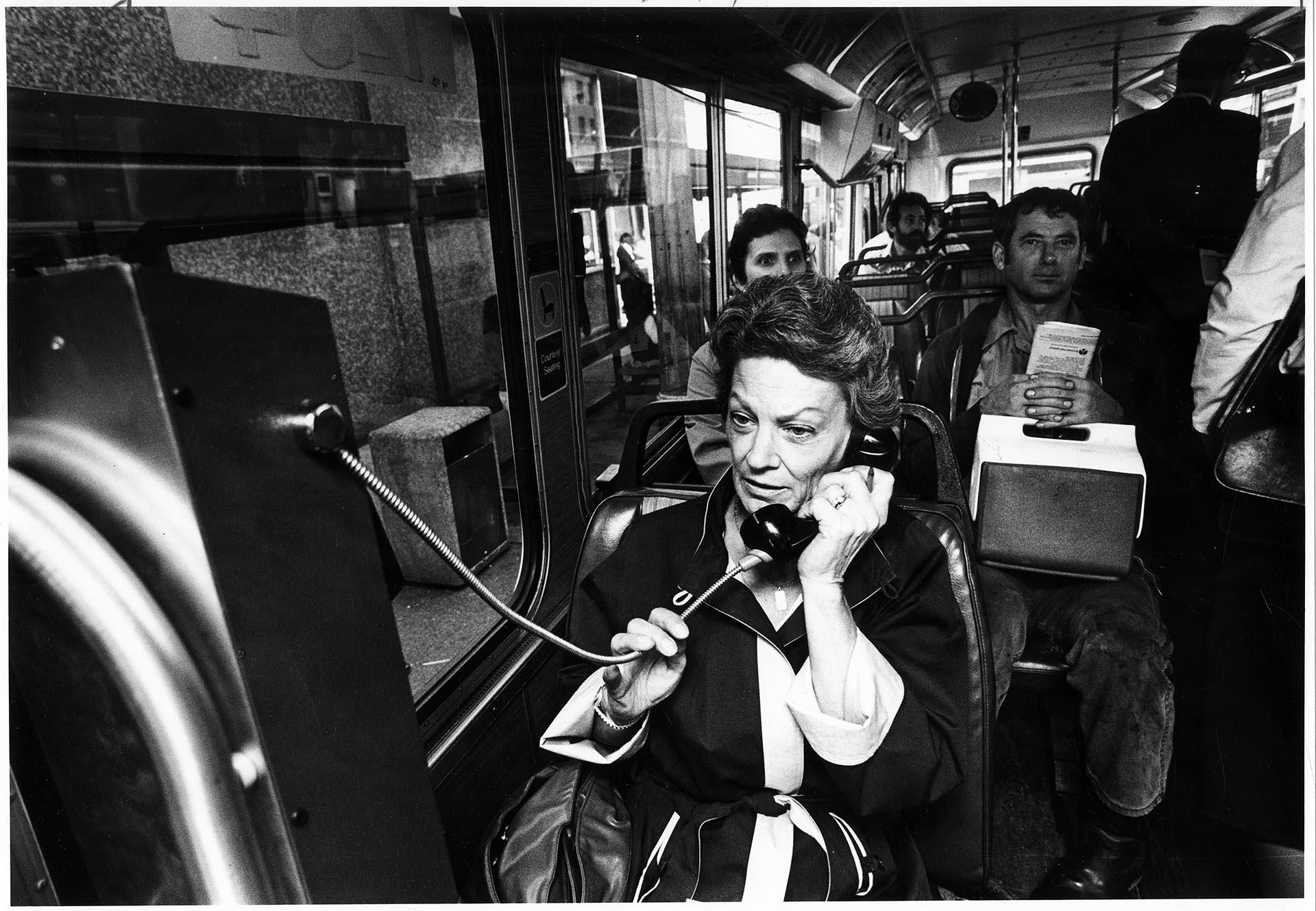 Image of Nancy Lightfoot making the first phone call from a bus, Seattle, September 11, 1985