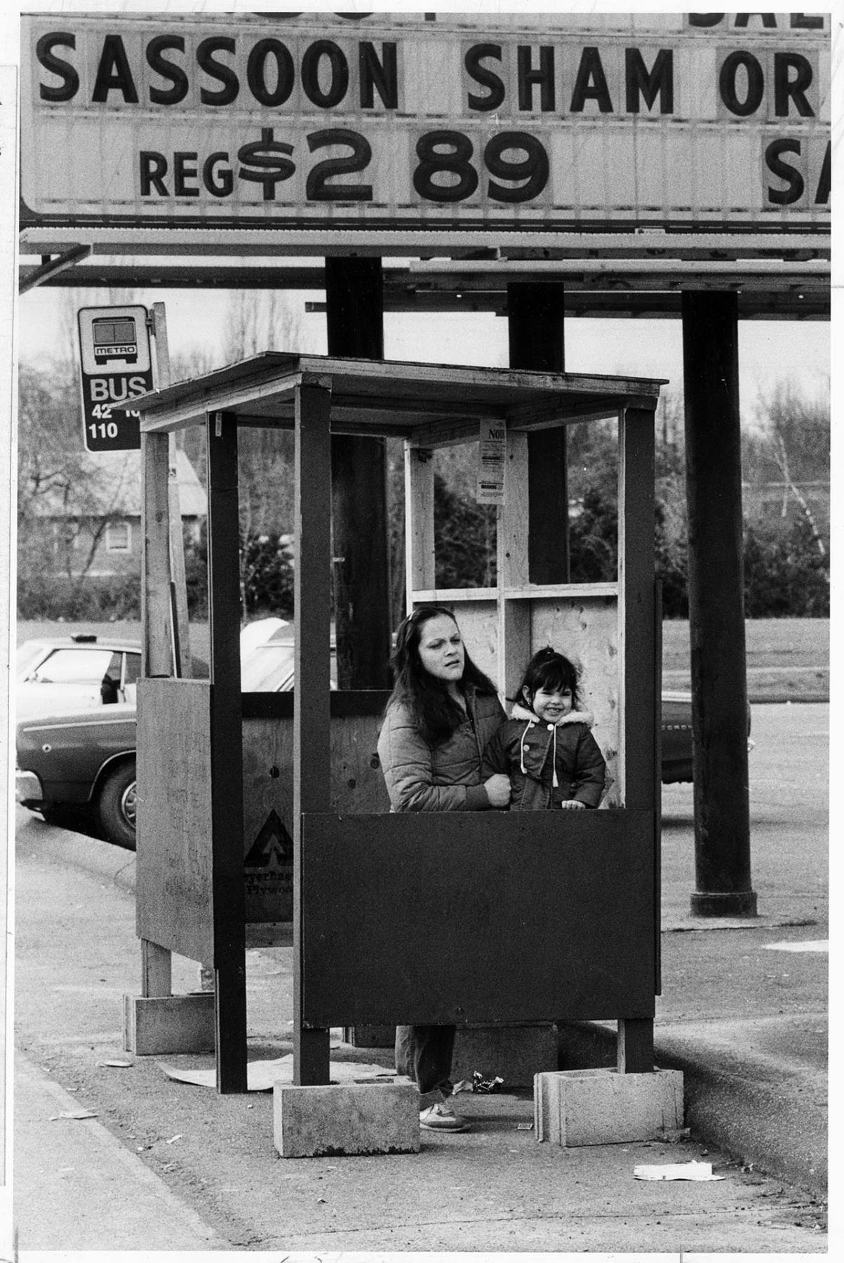 Image of Metro passengers waiting at temporary bus shelter, Seattle, March 6, 1982