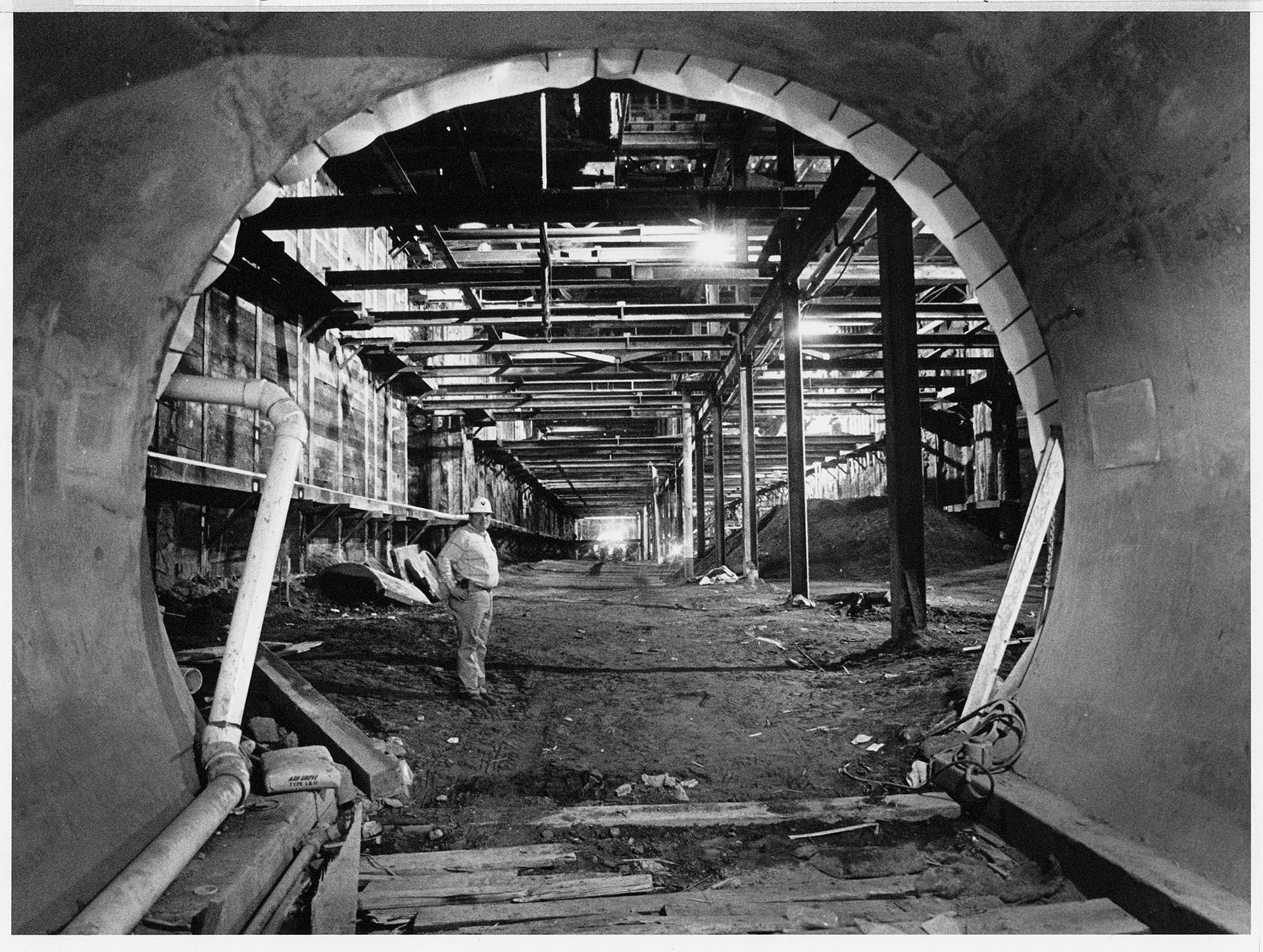 Image of Metro Transit inspector standing in bus tunnel under construction, Seattle, May 18, 1988