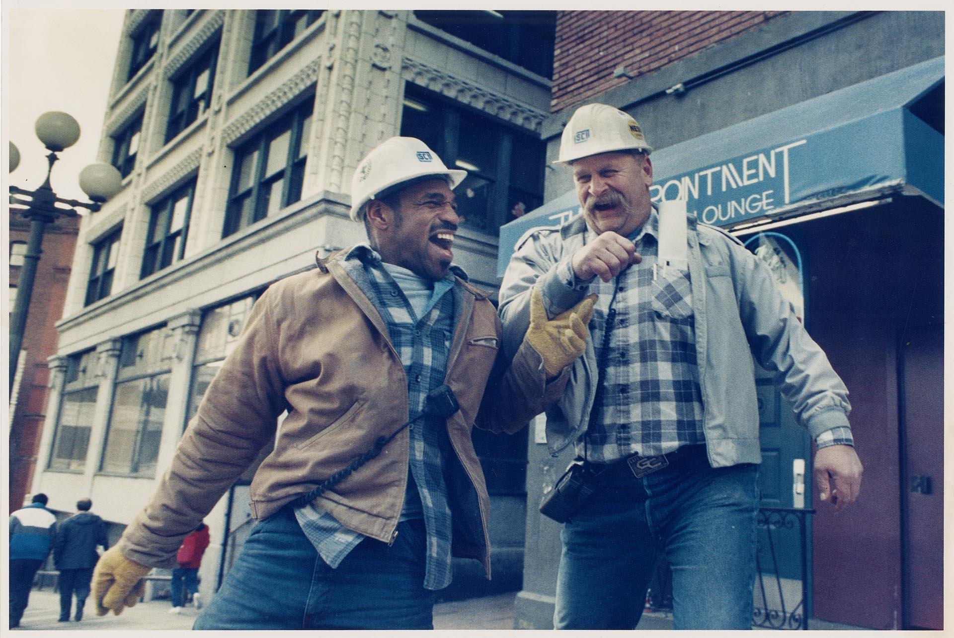 Image of Tunnel workers laughing outside The Appointment, Seattle, February 12, 1990