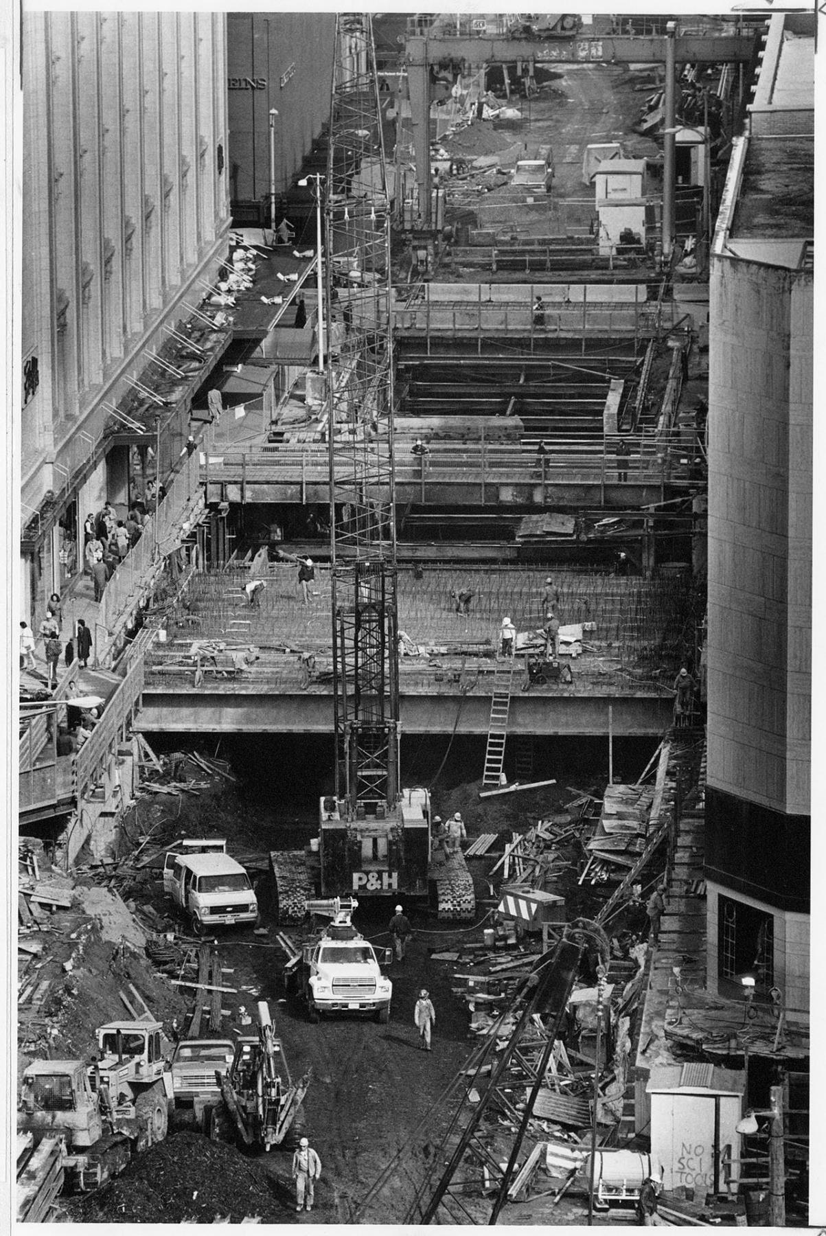 Image of Crane placing beams for Metro tunnel station, Seattle, March 9, 1988