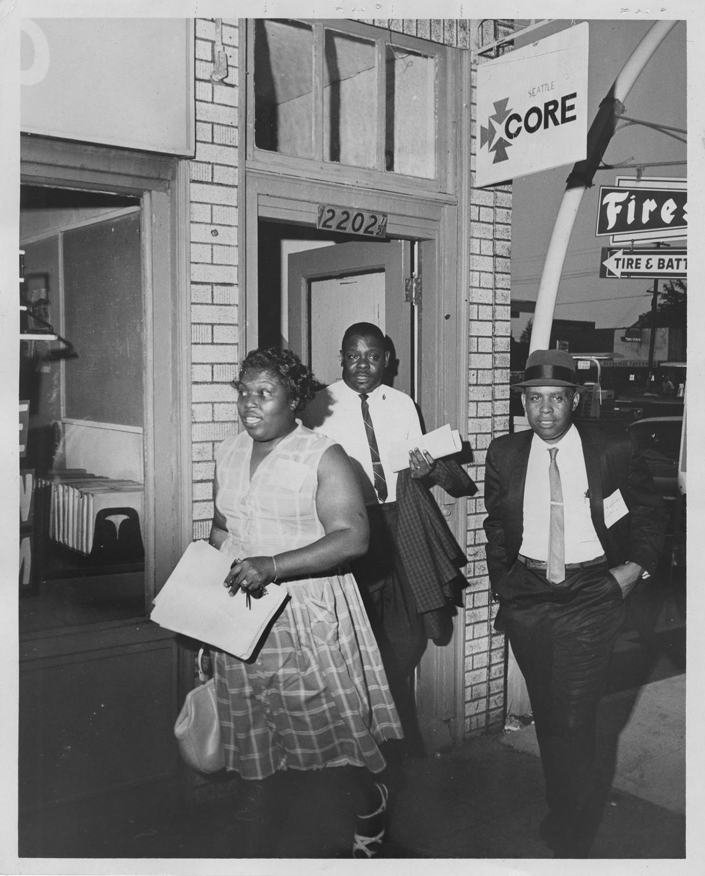Image of Freedom Patrol members leaving CORE headquarters, Seattle, July 24, 1965
