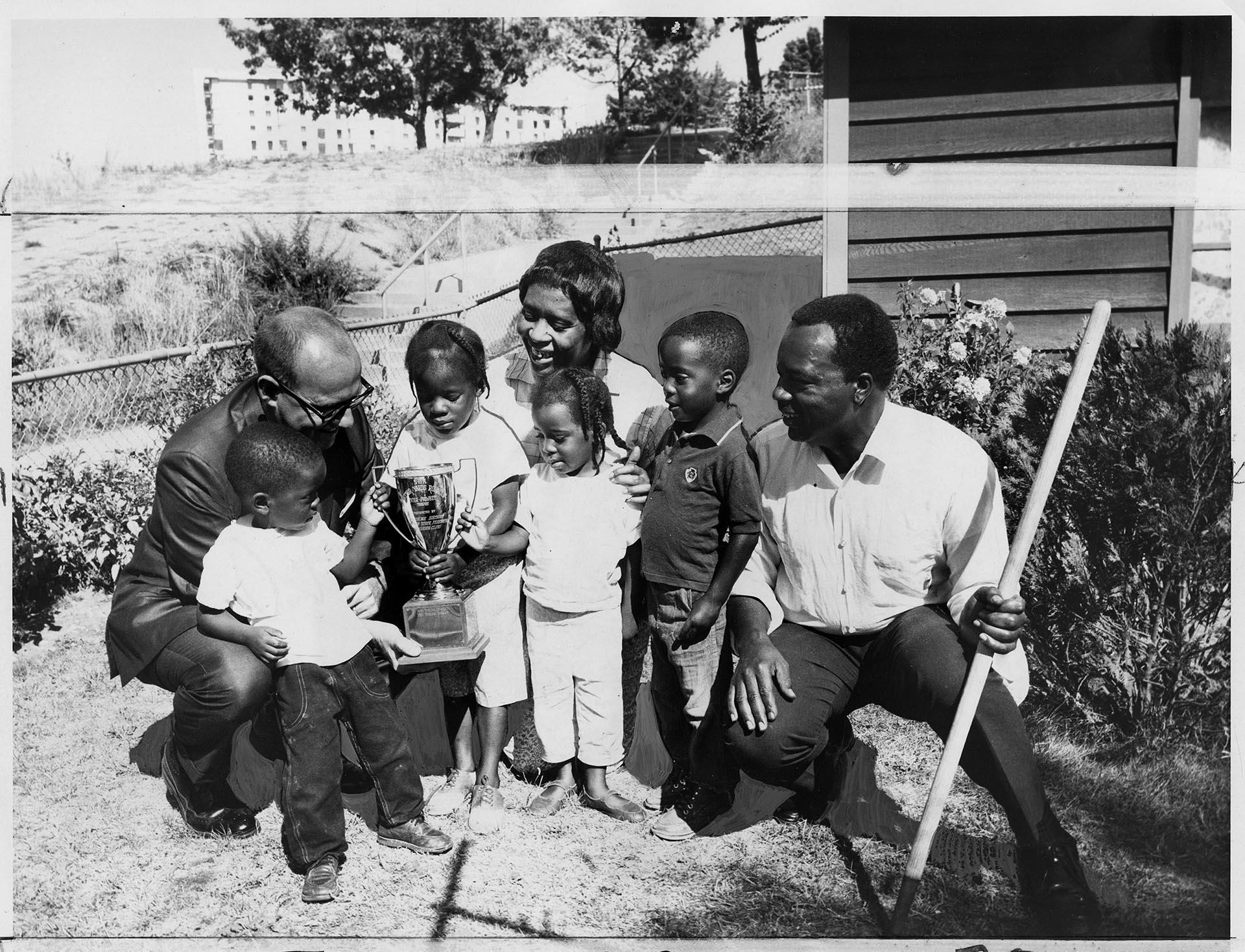 Image of Wilson family with Better Yards Roundup trophy, September 13, 1967