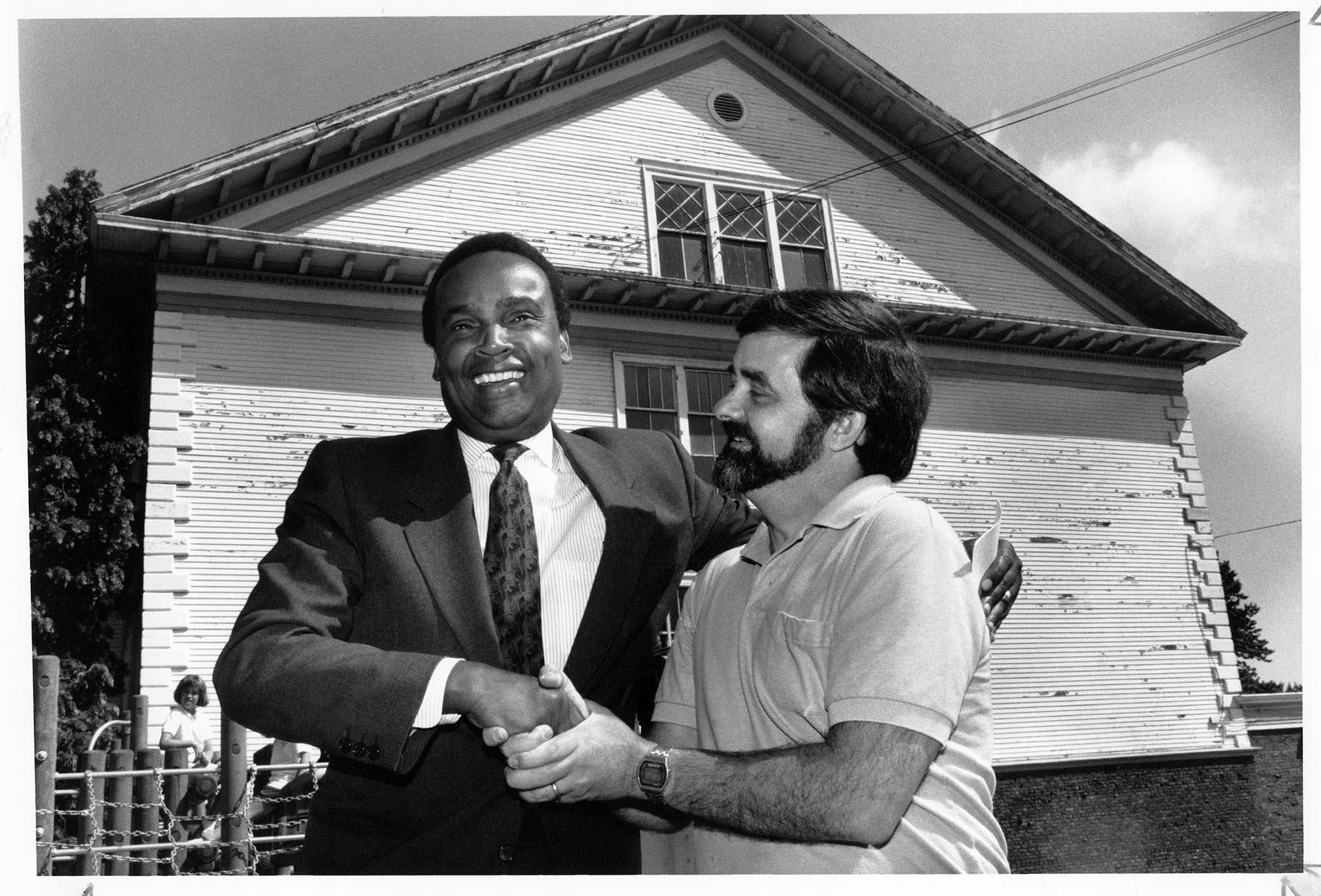 Image of Norm Rice and Jim Street outside Stevens Elementary School, Seattle, August 2, 1990