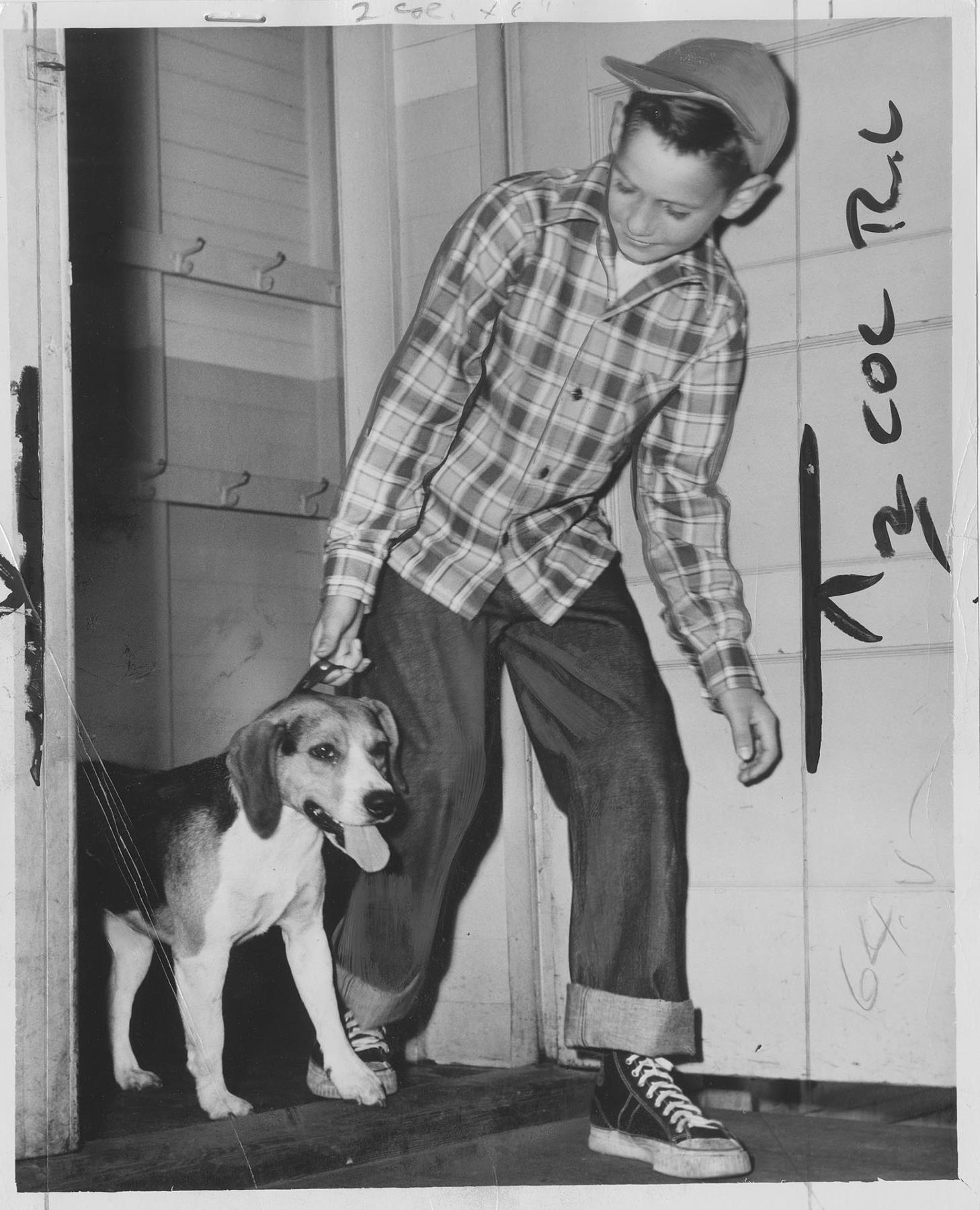 Image of Boy and his dog on first day of school, Seattle, September 7, 1949
