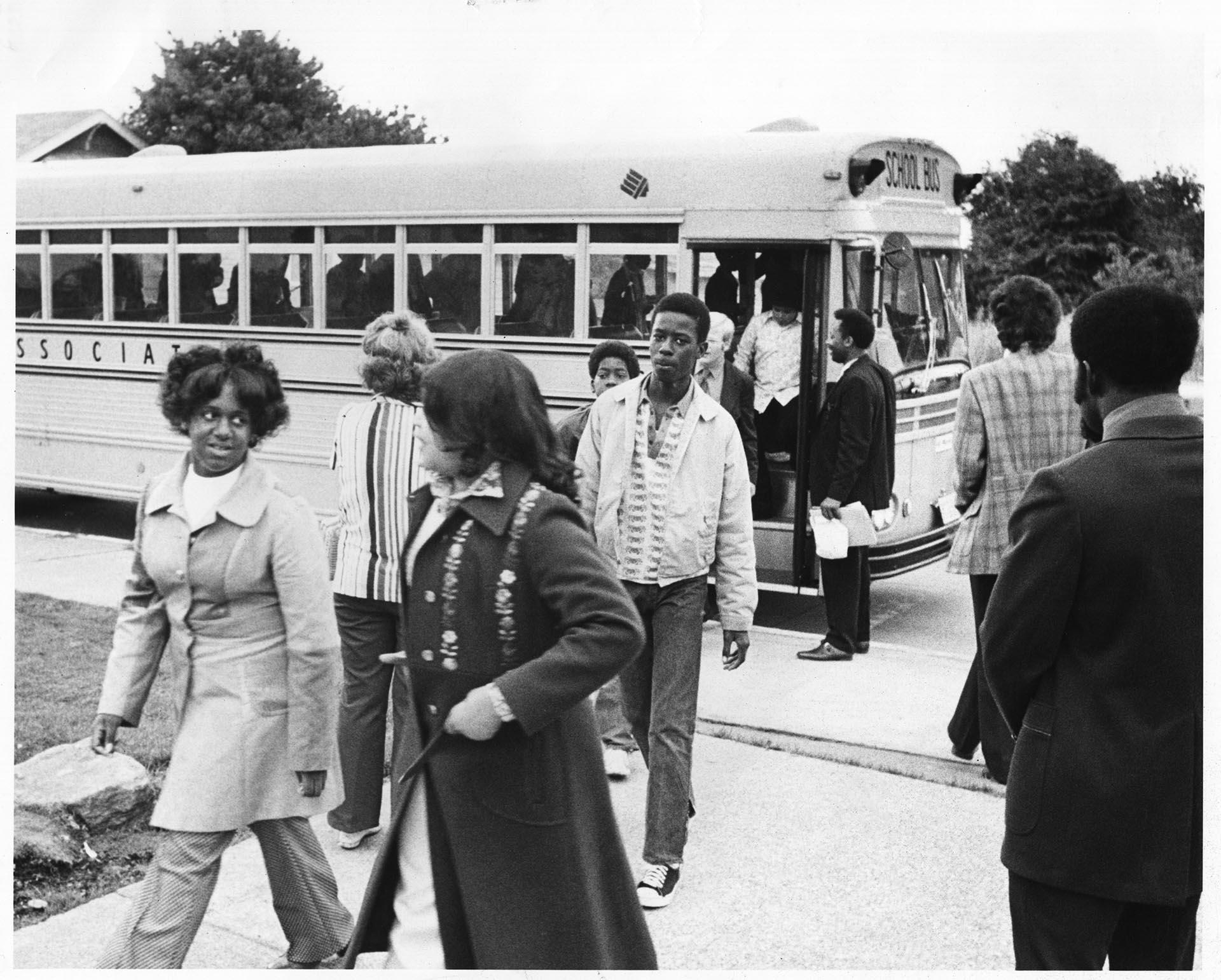 Image of Black students arriving by bus at Wilson Middle School, Seattle, September 6, 1972
