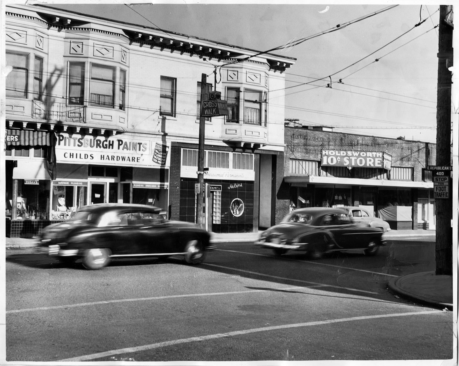 Image of Cars passing through crosswalk at 15th and Republican, Seattle, April 15, 1951