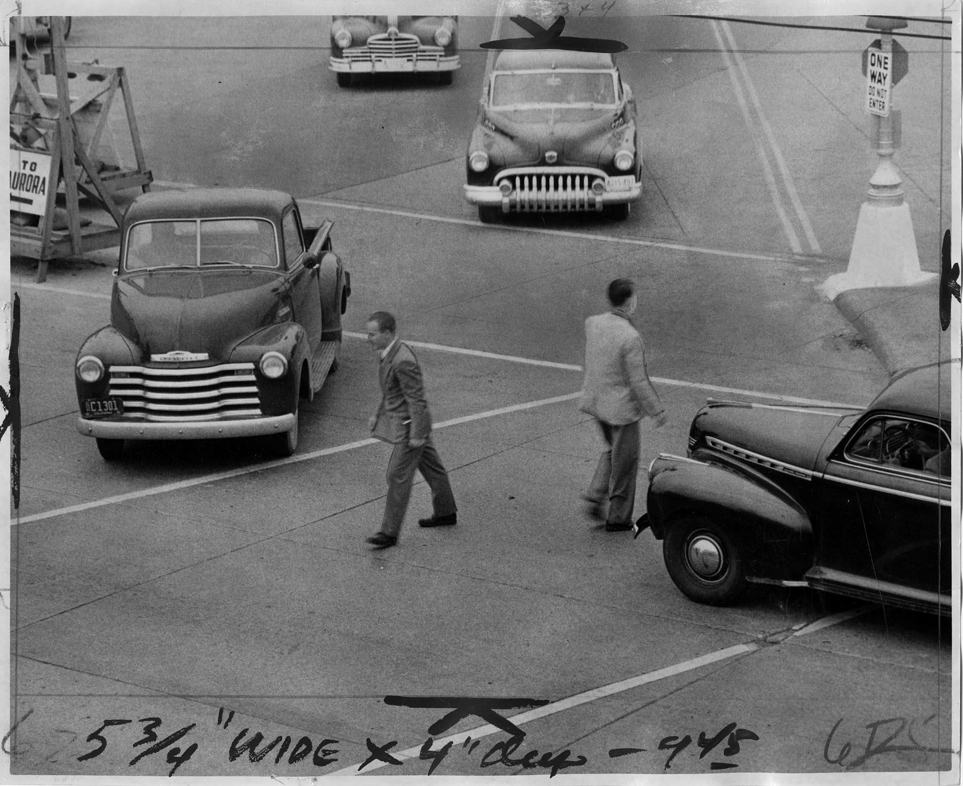 Image of Pedestrians crossing intersection at 7th Ave and Battery St., Seattle, May 25, 1951