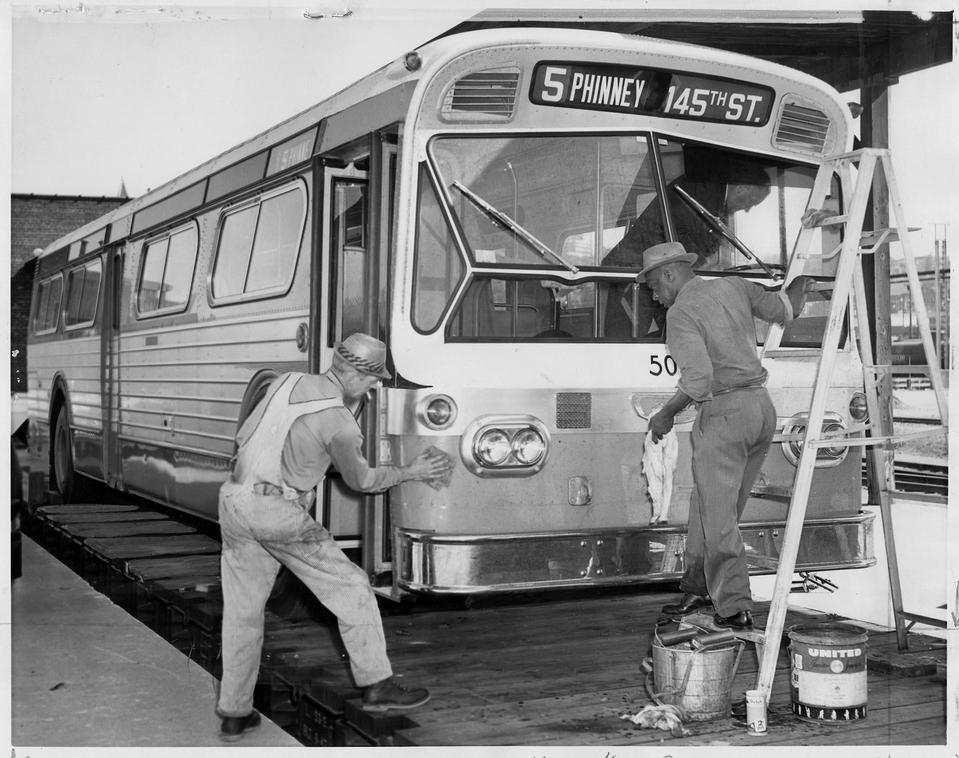 Image of Workmen cleaning transit bus, Seattle, May 16, 1963