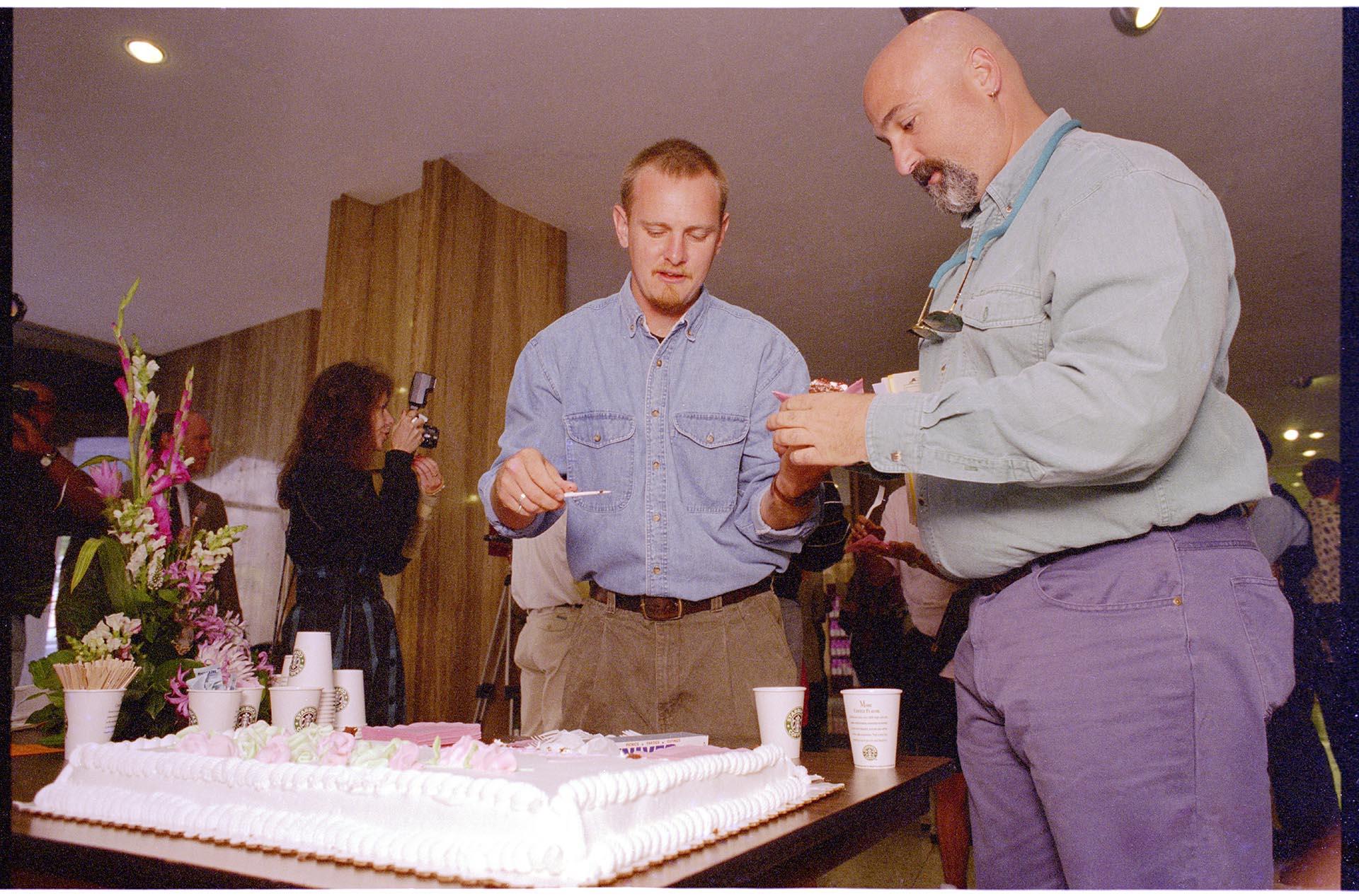 Image of Gay couple having cake after registering a domestic partnership, Seattle, September 6, 1994