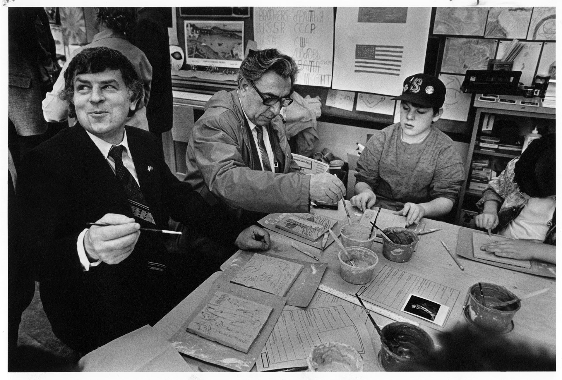 Image of Jakob Schapiro, Leon Admov, and Matthew Phillips painting tiles, Seattle, February 29, 1988