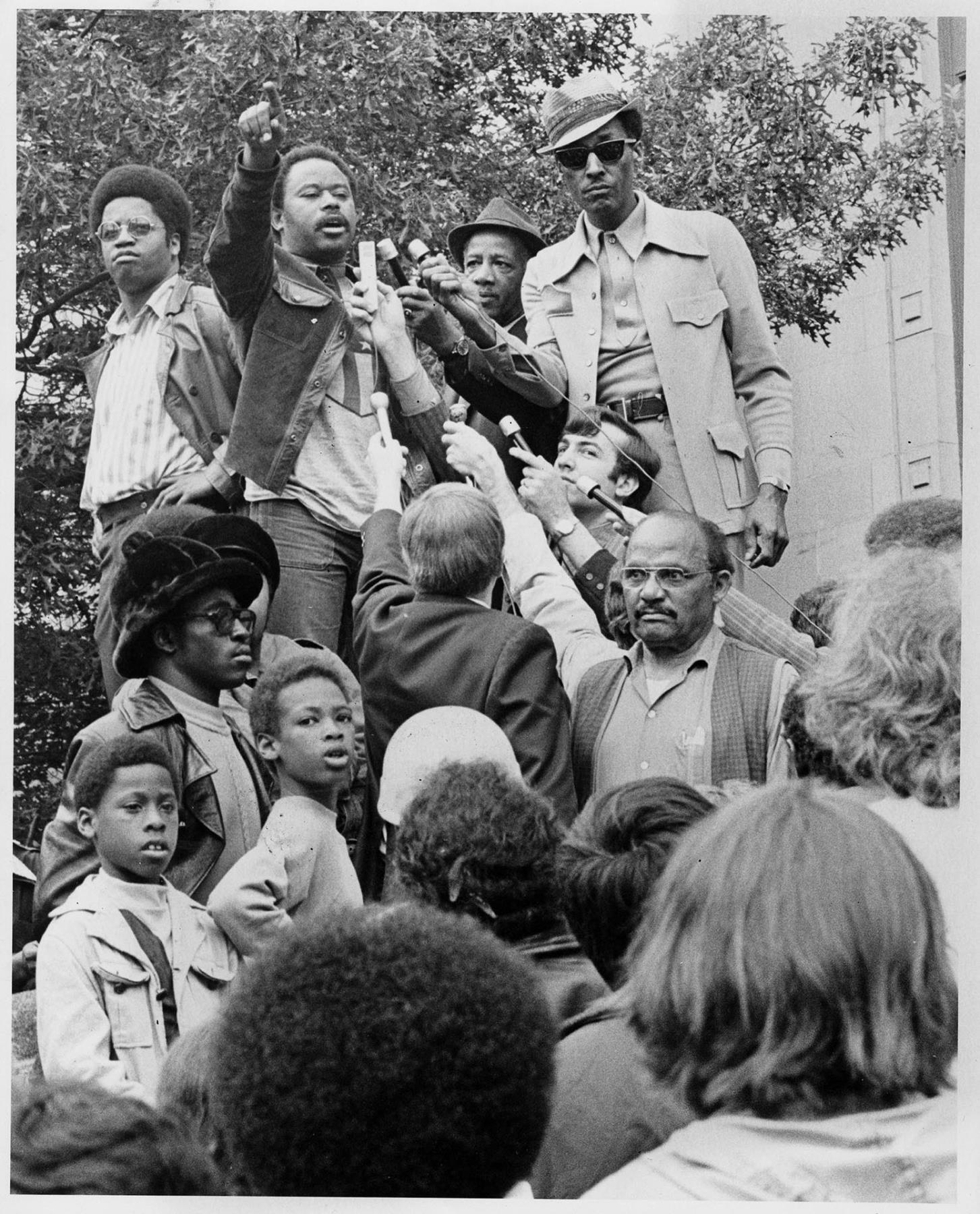 Image of Larry Gossett and Tyree Scott outside Federal Courthouse, Seattle, June 15, 1972