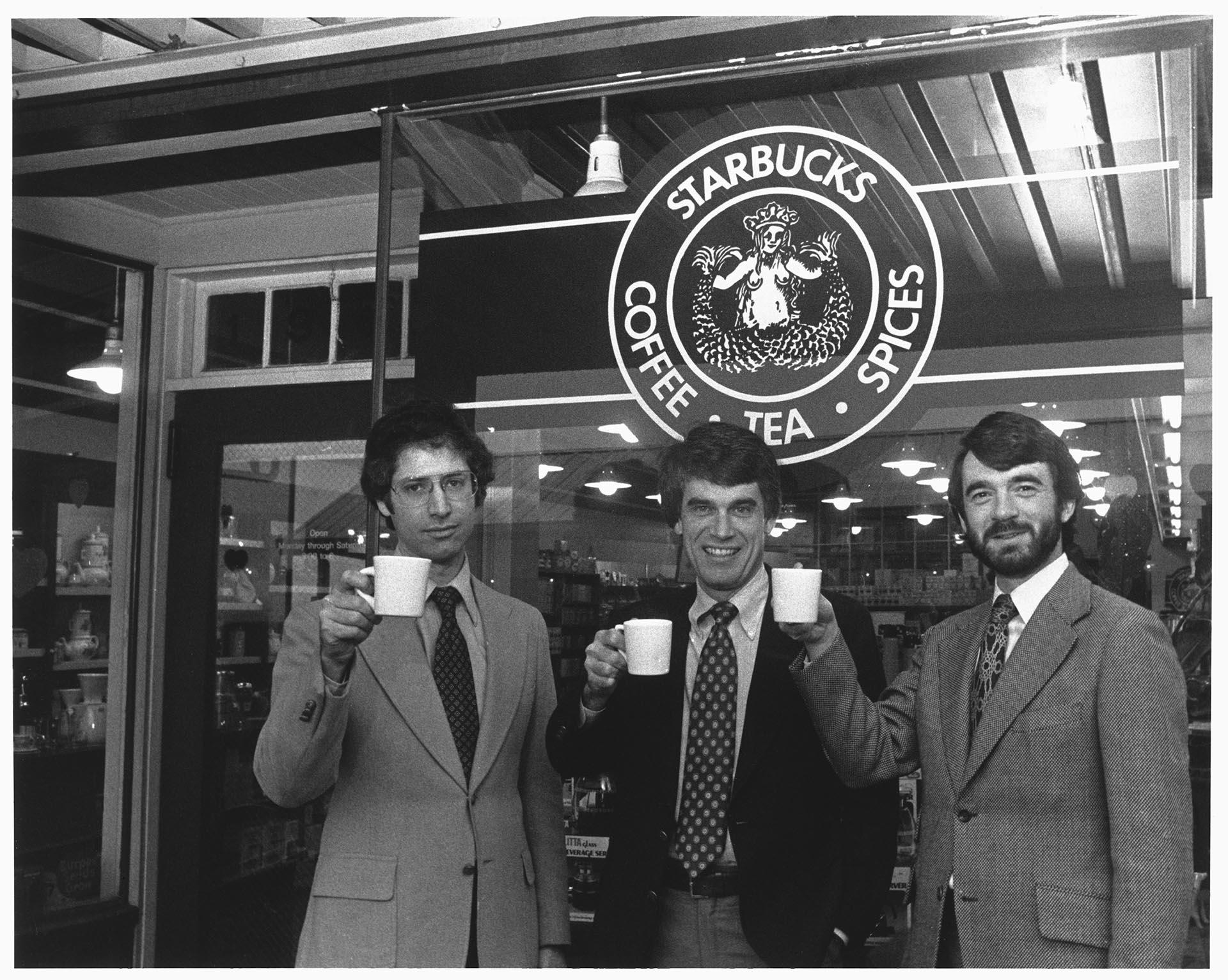 Image of Starbucks founders posing outside their store, Seattle, February 1979