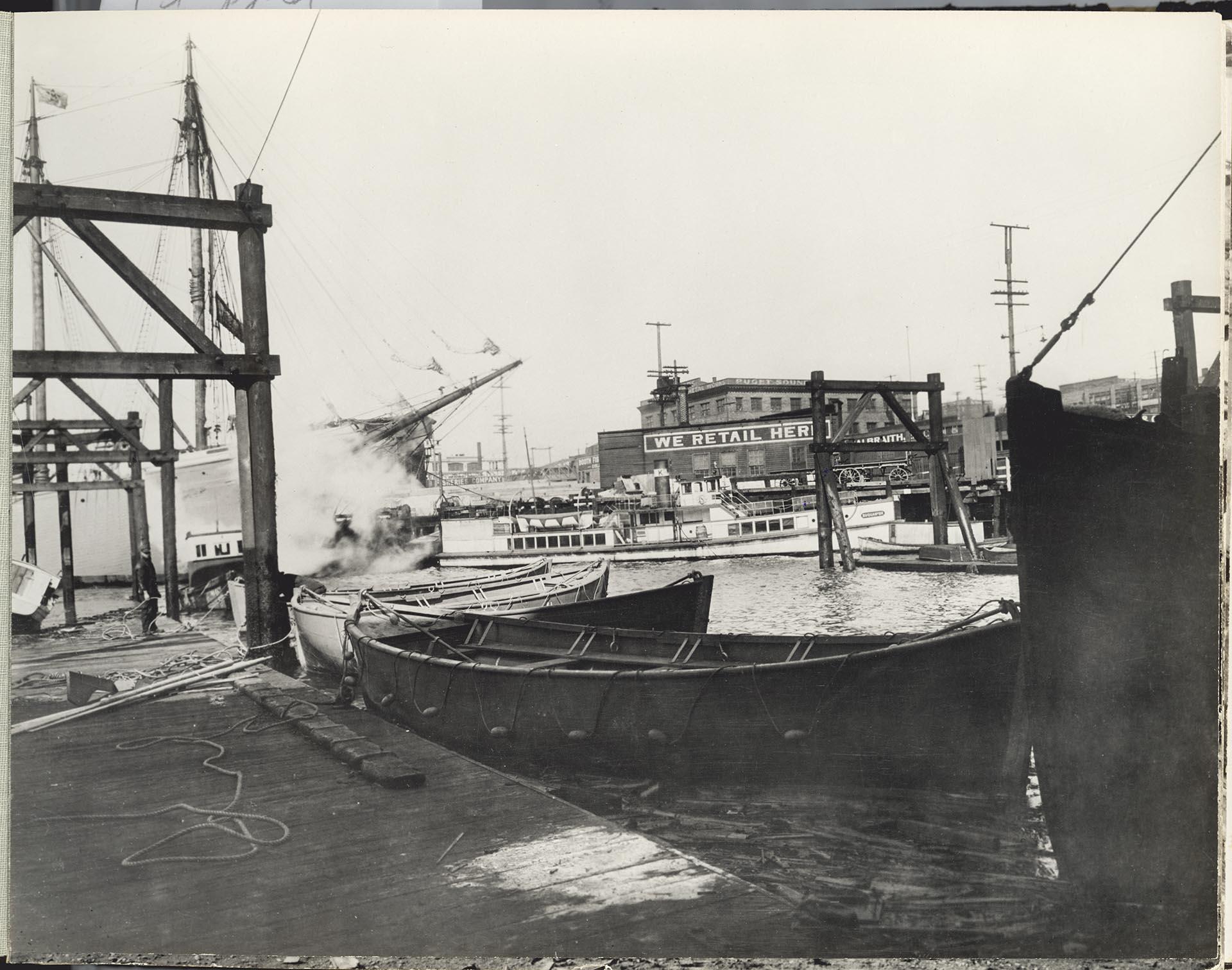 Image of World War I life boats near dock in Elliott Bay, Seattle, circa 1918
